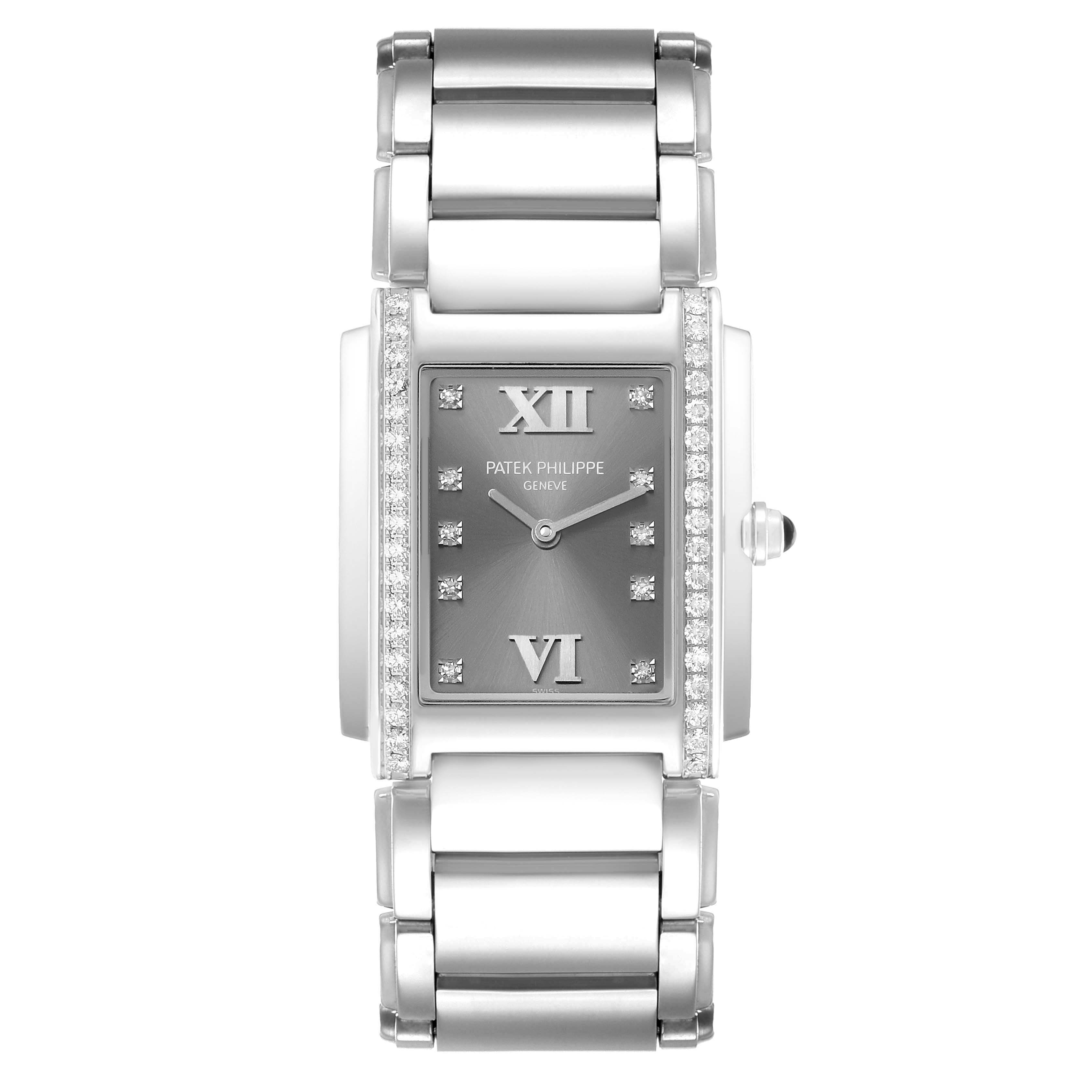 The Patek Philippe Twenty-4 4910/10A-010 Women's Stainless Steel Grey Dial watch is shown from a top-down angle, highlighting the face, bracelet, and diamond accents.