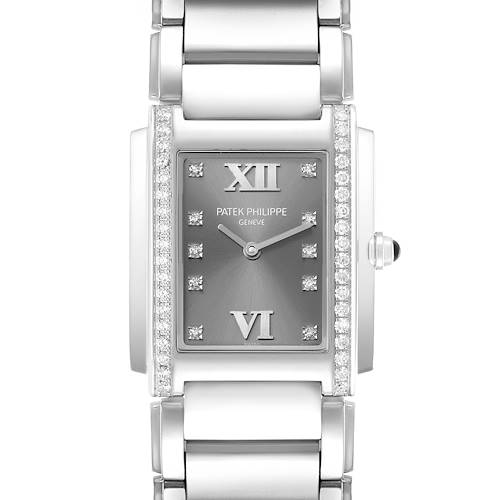 The Patek Philippe Twenty-4 4910/10A-010 Women's Stainless Steel Grey Dial watch is shown from the front, highlighting its rectangular face, diamond accents, and silver bracelet.