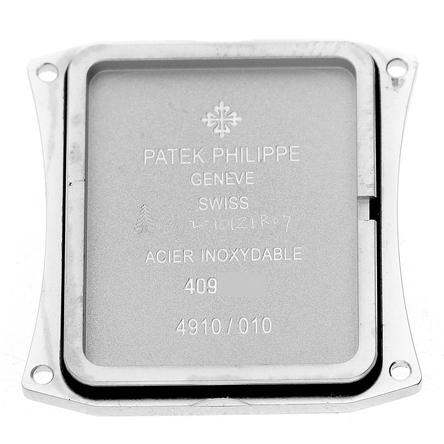 The image shows the back case of a Patek Philippe Twenty-4 4910/10A-010 Women's Stainless Steel Grey Dial watch, emphasizing the engraved details.