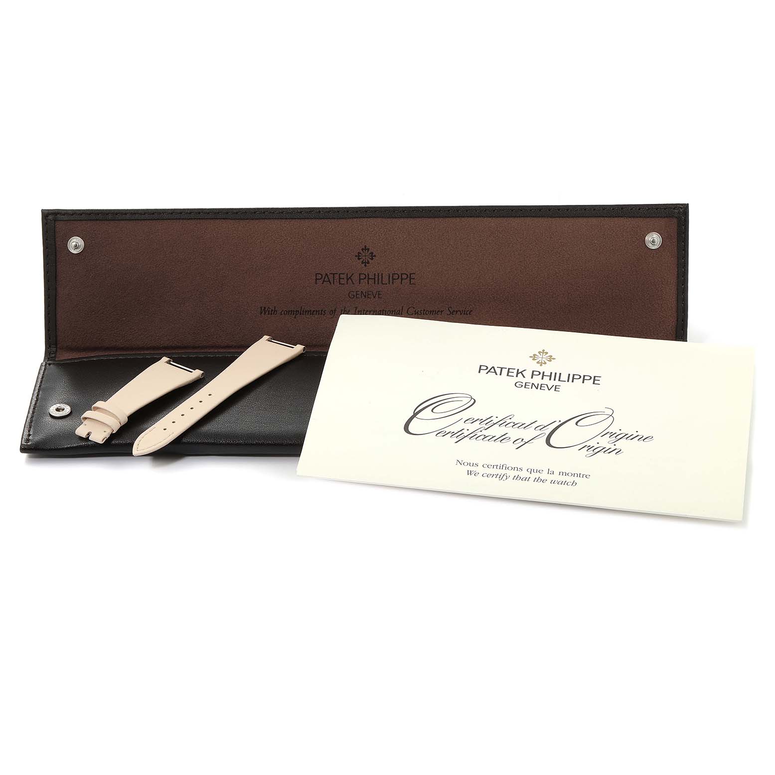 The image shows Patek Philippe Twenty-4 4920R-10 Women's Rose Gold Silver Dial 4920R-10 Women's Rose Gold Silver Dial watch straps and a certificate of origin displayed with a leather case.