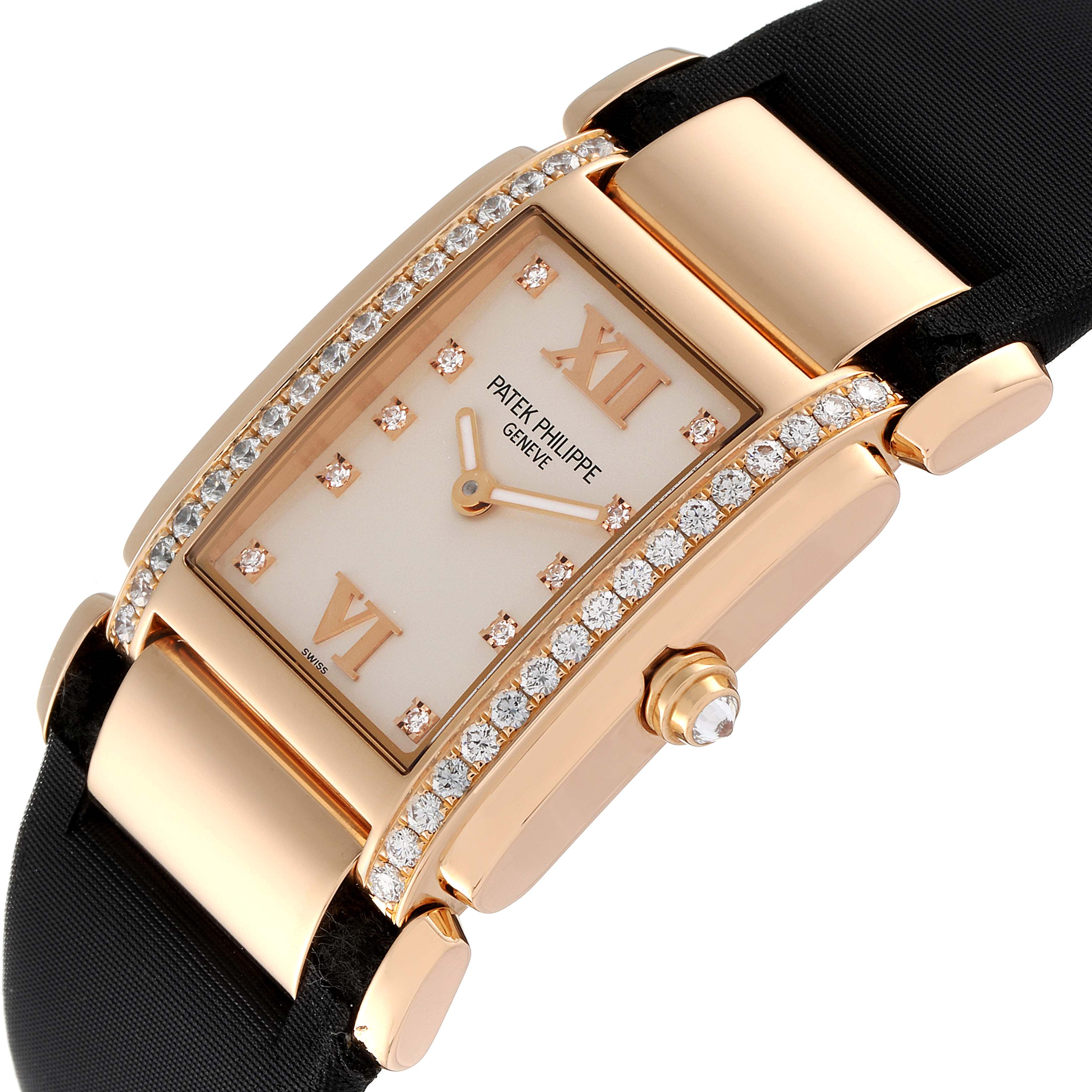 The image shows a close-up angled view of a Patek Philippe Twenty-4 4920R-10 Women's Rose Gold Silver Dial 4920R-10 Women's Rose Gold Silver Dial watch, highlighting its diamond-studded bezel and dial.