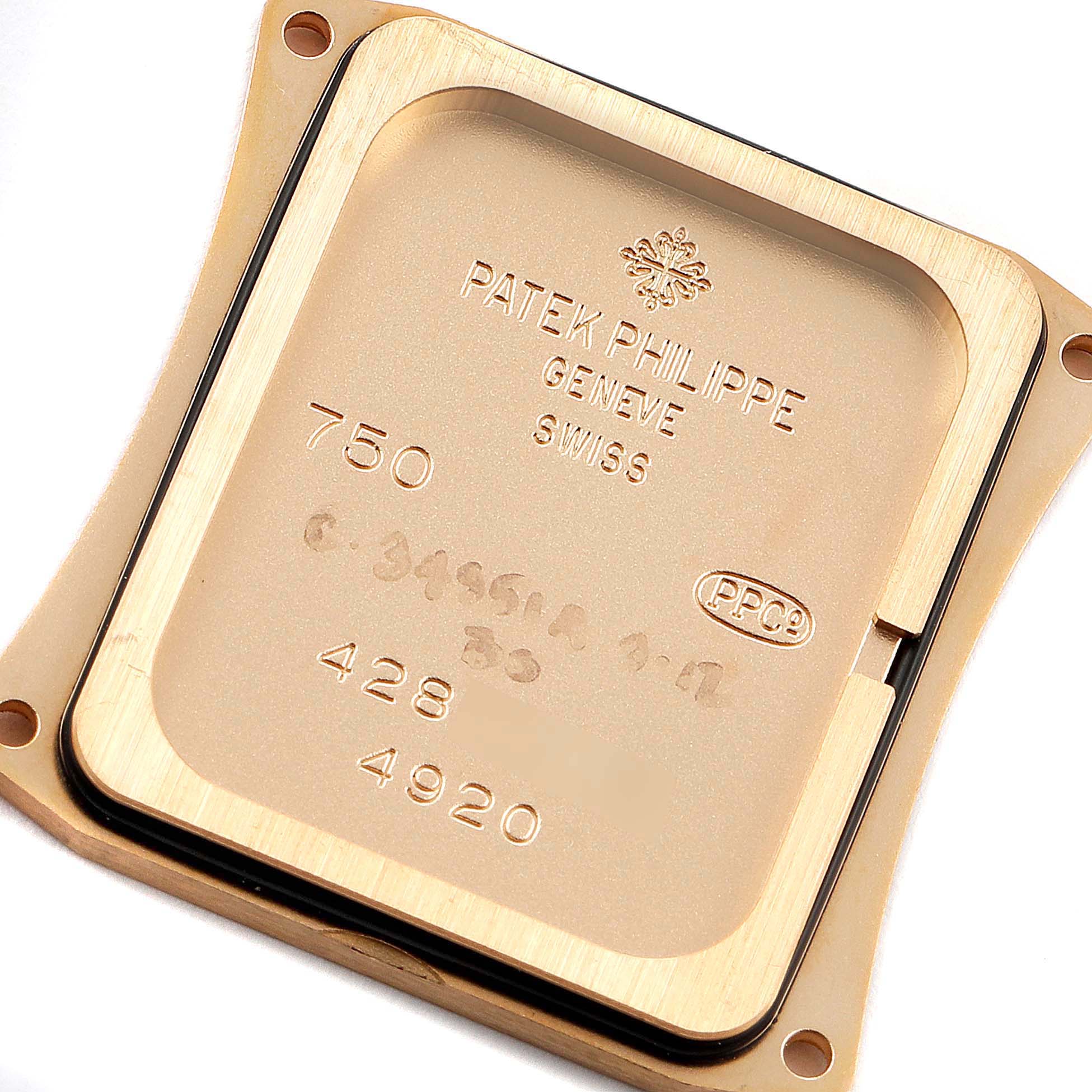 This image shows the back cover of a Patek Philippe Twenty-4 4920R-10 Women's Rose Gold Silver Dial 4920R-10 Women's Rose Gold Silver Dial watch, viewed from the inside.