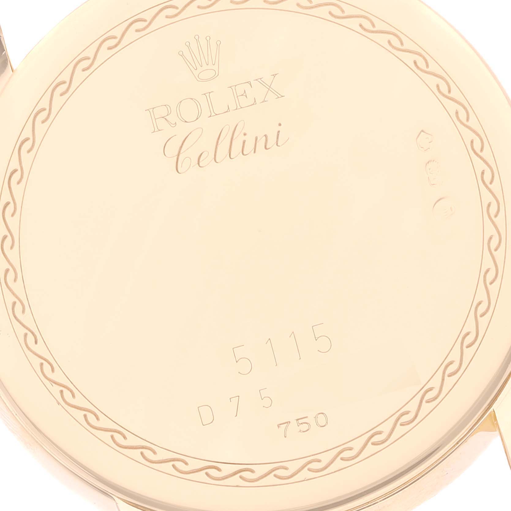 The image shows the engraved case back of a Rolex Cellini 5115 Men's Yellow Gold Beige Dial 5115 Men's Yellow Gold Beige Dial model with the brand's logo and model information evident.