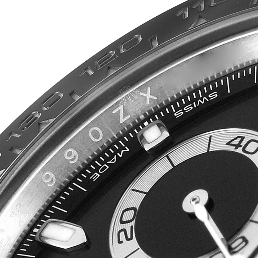 This close-up shows the bezel and partial dial of a Rolex Daytona 116500 Men
s Stainless Steel Black Dial 116500 Men
s Stainless Steel Black Dial watch.