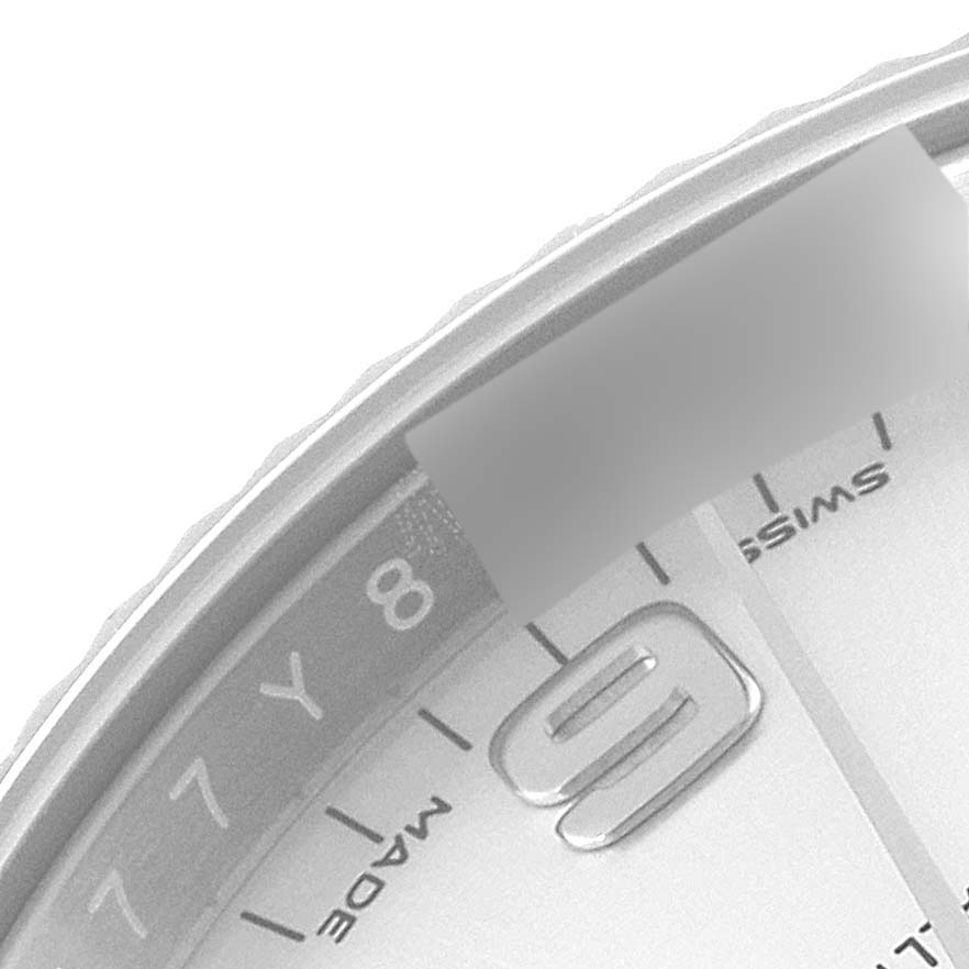 The image shows a close-up of the dial and bezel of a Rolex Datejust 115234 Men's Stainless Steel Silver Dial 115234 Men's Stainless Steel Silver Dial watch, highlighting the numbers and part of the text.