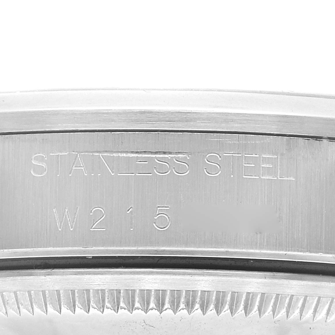 The image shows a close-up of the side of a Rolex Date 15200 Men's Stainless Steel Blue Dial 15200 Men's Stainless Steel Blue Dial model, featuring the engraved text on its stainless steel case.