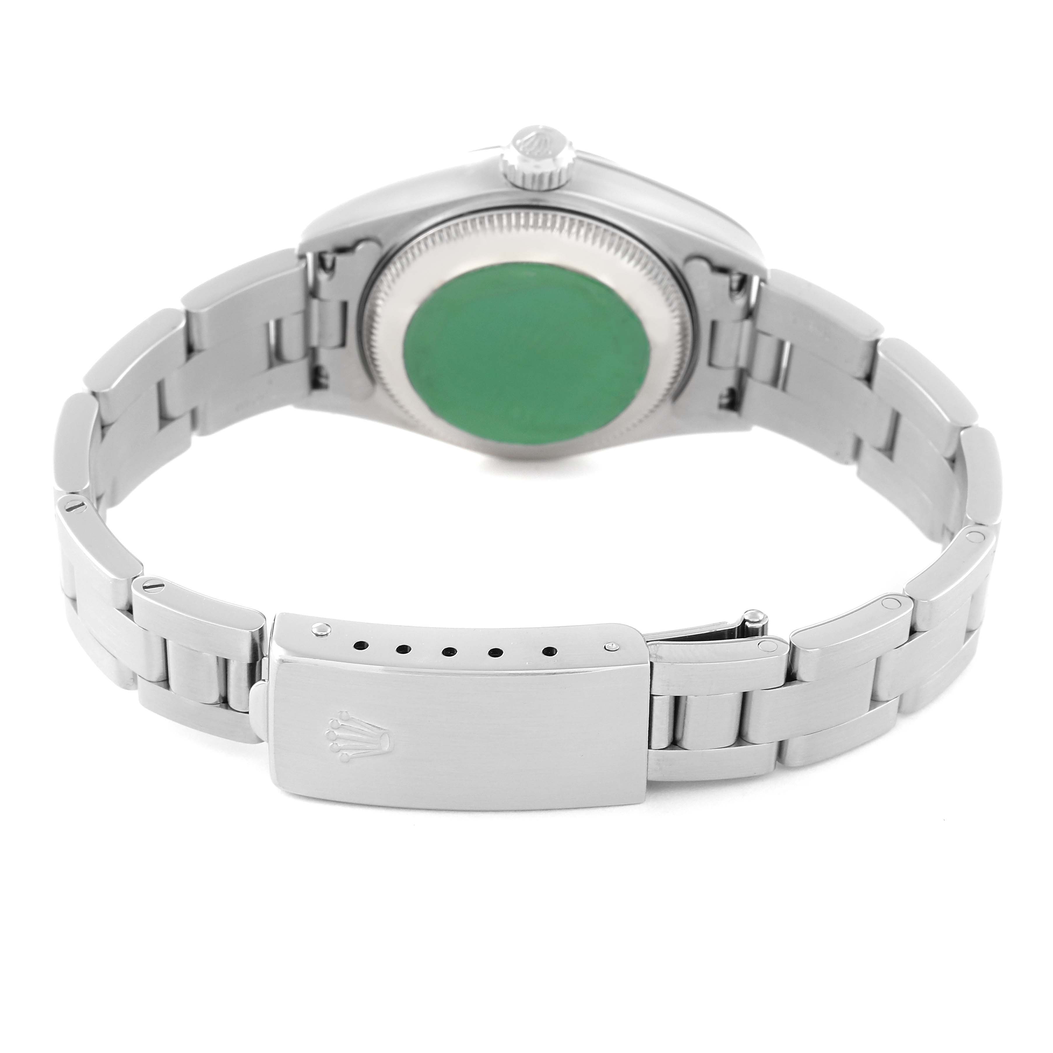 The image shows the backside of the Rolex Date 79160 Women's Stainless Steel Silver Dial 79160 Women's Stainless Steel Silver Dial model watch, including its bracelet and clasp.