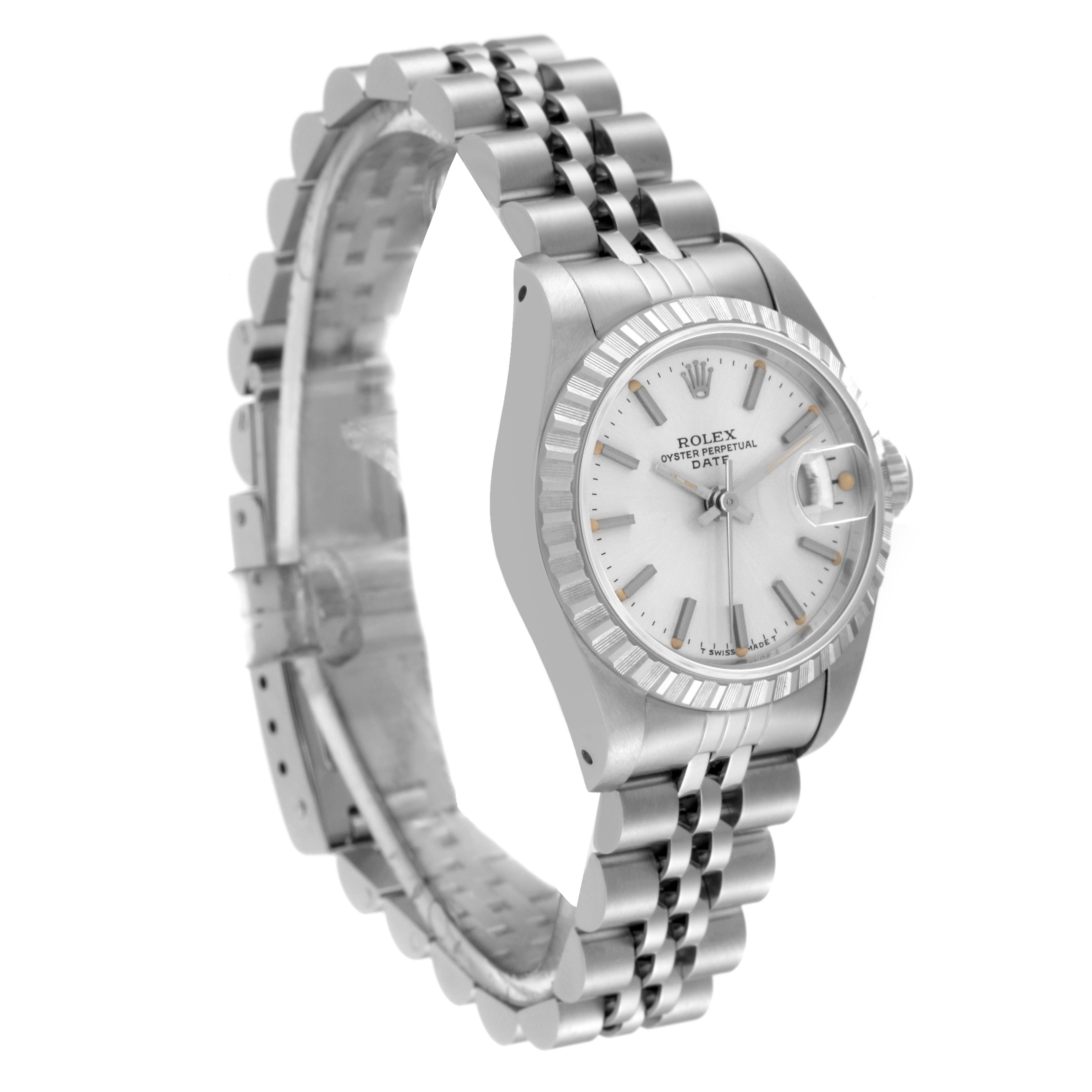 This image shows a side angle of a Rolex Date 69240 Women's Stainless Steel Silver Dial 69240 Women's Stainless Steel Silver Dial model watch, highlighting the face, bezel, and bracelet.