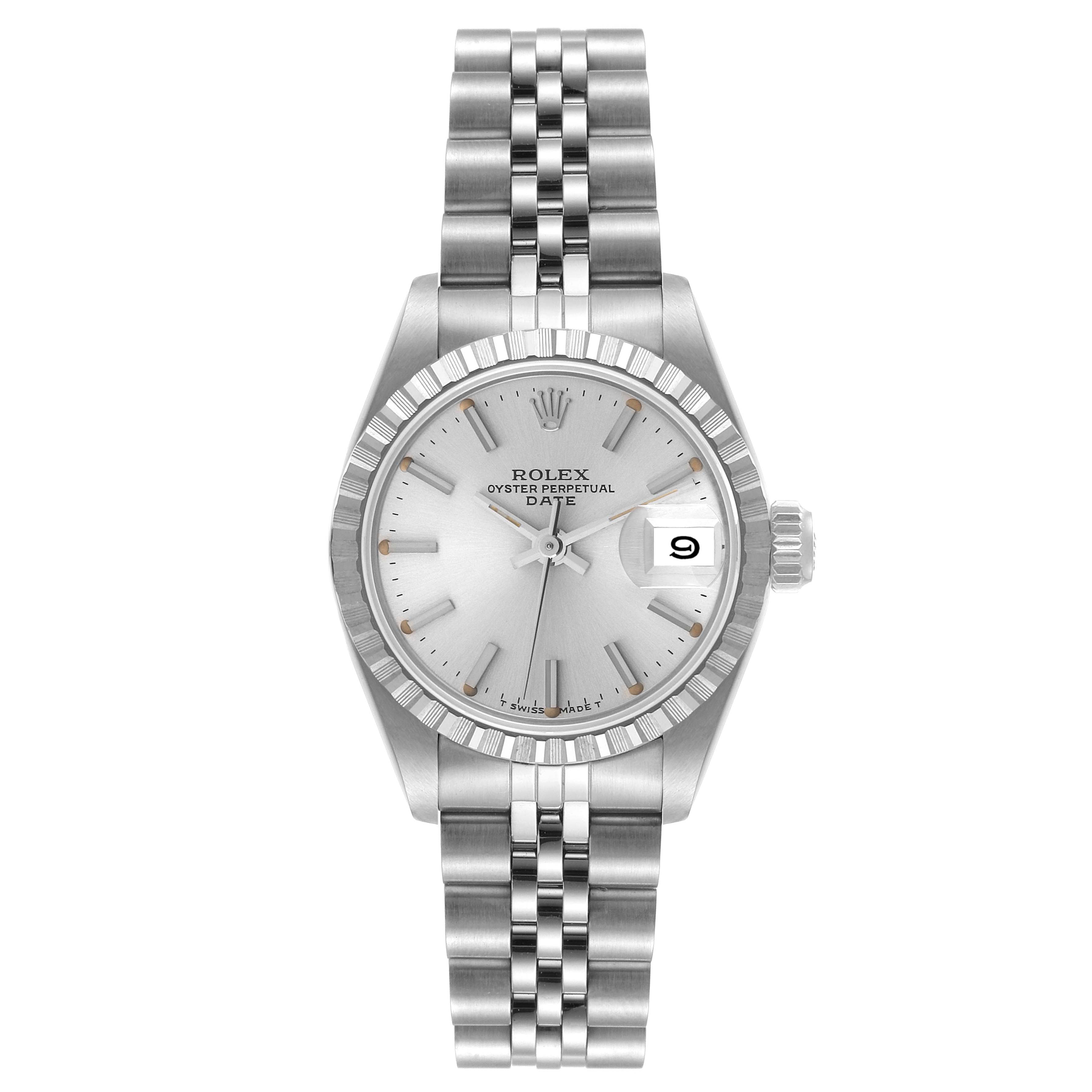 The image shows a front view of a Rolex Date 69240 Women's Stainless Steel Silver Dial 69240 Women's Stainless Steel Silver Dial model watch, highlighting its face, fluted bezel, bracelet, and date function.