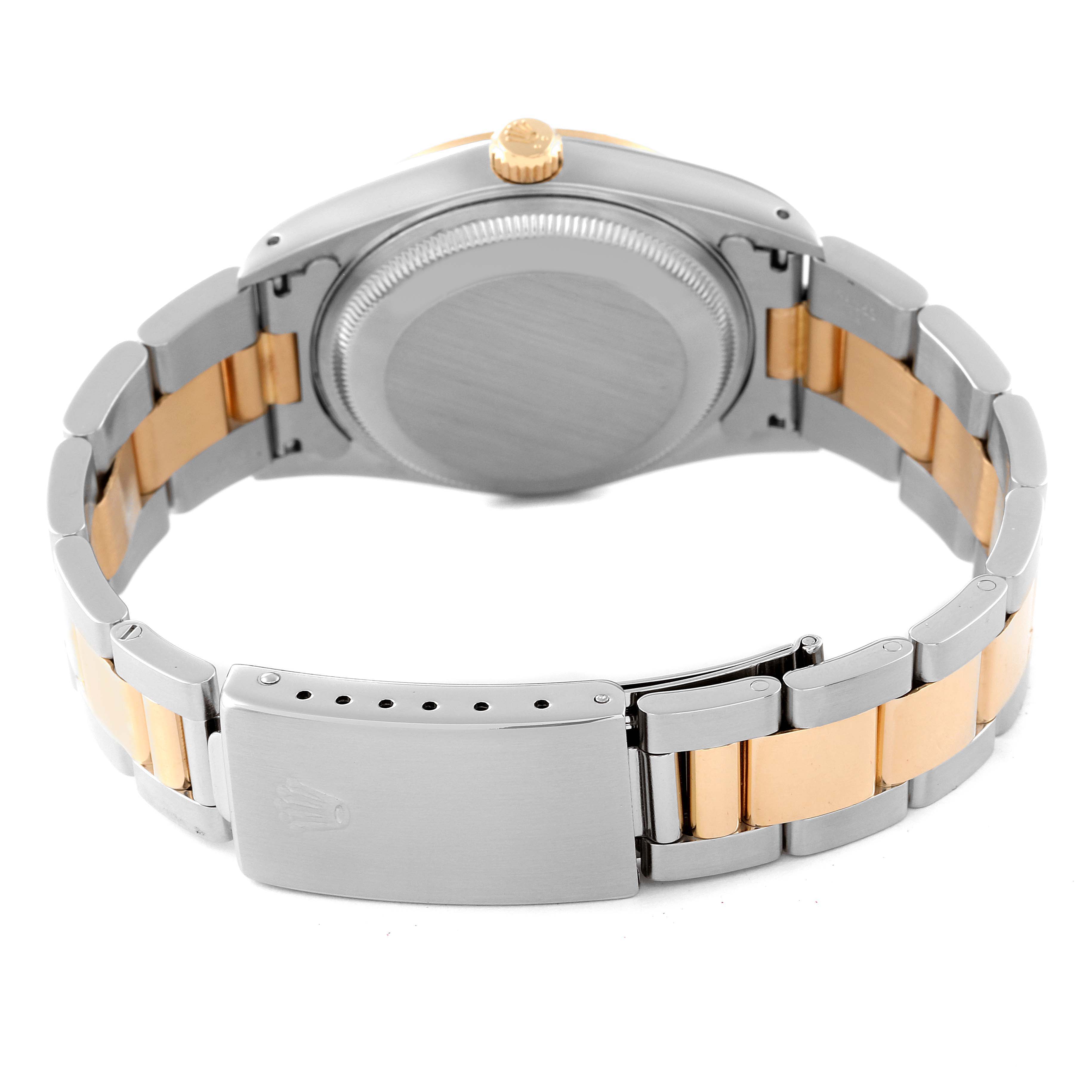 The image shows the back view of a Rolex Date 15223 Men's Steel and Gold (two tone) Black Dial 15223 Men's Steel and Gold (two tone) Black Dial model watch, highlighting the clasp, case back, and two-tone bracelet.