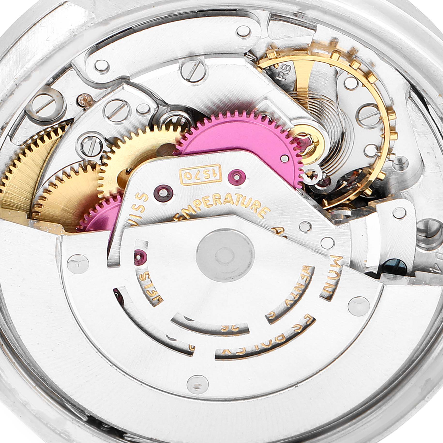 The image shows the intricate internal mechanism of a Vintage Collection Rolex watch from a top-down angle.
