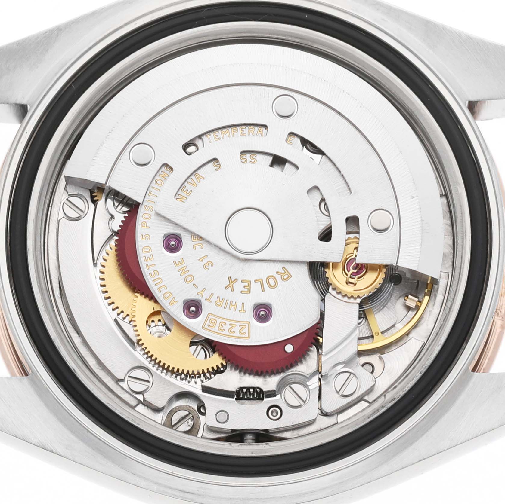 The image shows the back view of the Rolex Datejust 279161 Women's Stainless Steel White Dial, displaying its movement and intricate internal components.
