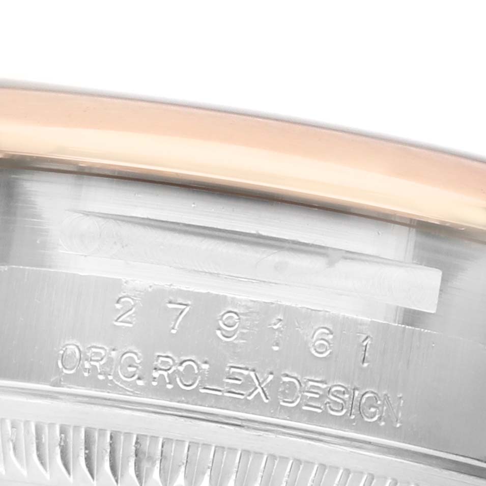The image shows a close-up angle of the side of a Rolex Datejust 279161 Women's Stainless Steel White Dial watch, featuring model numbers and "ORIG ROLEX DESIGN" engraving.
