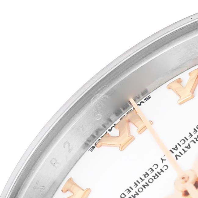 The image shows a close-up of the Rolex Datejust 279161 Women's Stainless Steel White Dial watch, highlighting part of the bezel, dial, and some hour markers.