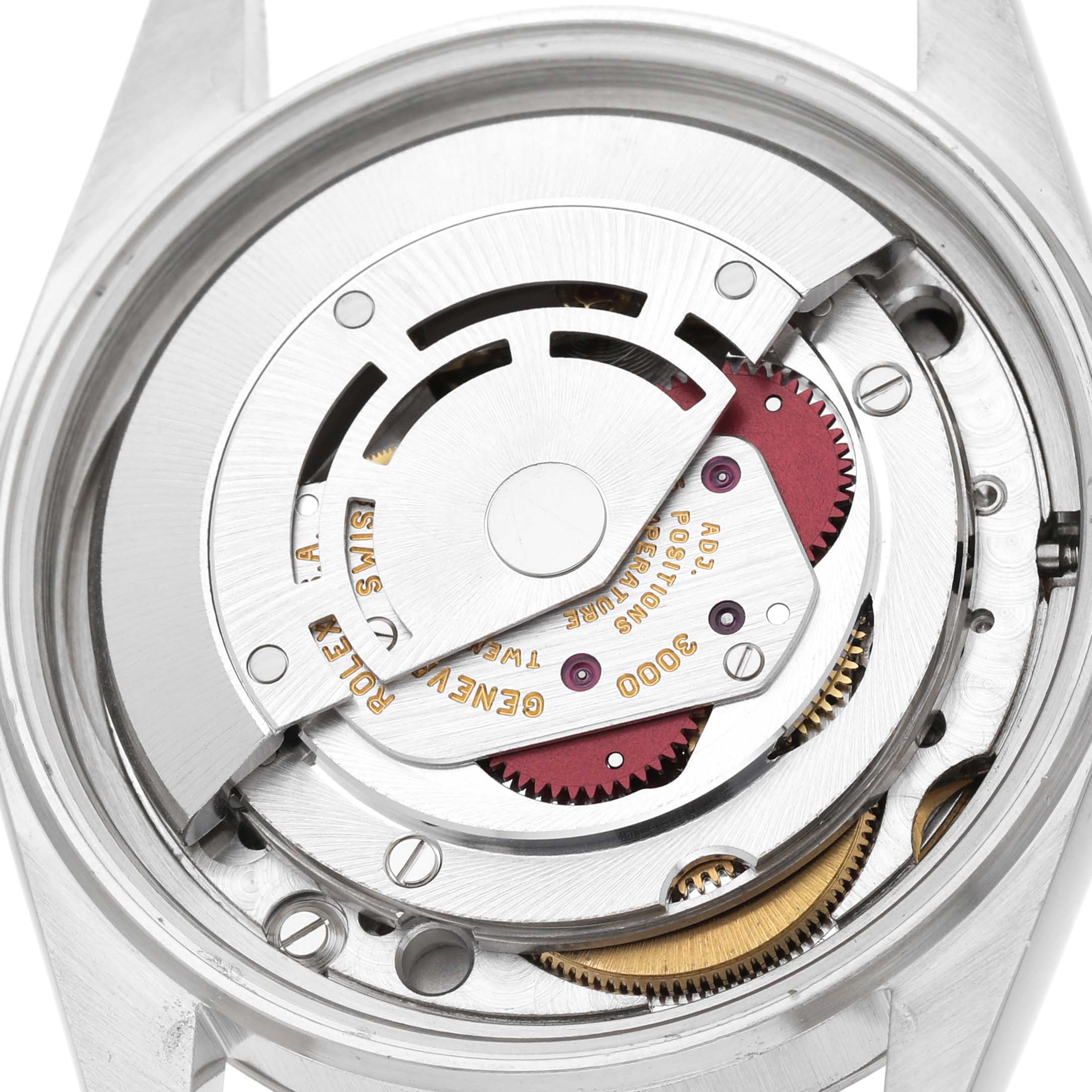 The image shows the back view of the Rolex Datejust 16014 Men's Steel and Gold (two tone) Blue Dial, revealing its inner mechanical movement components.