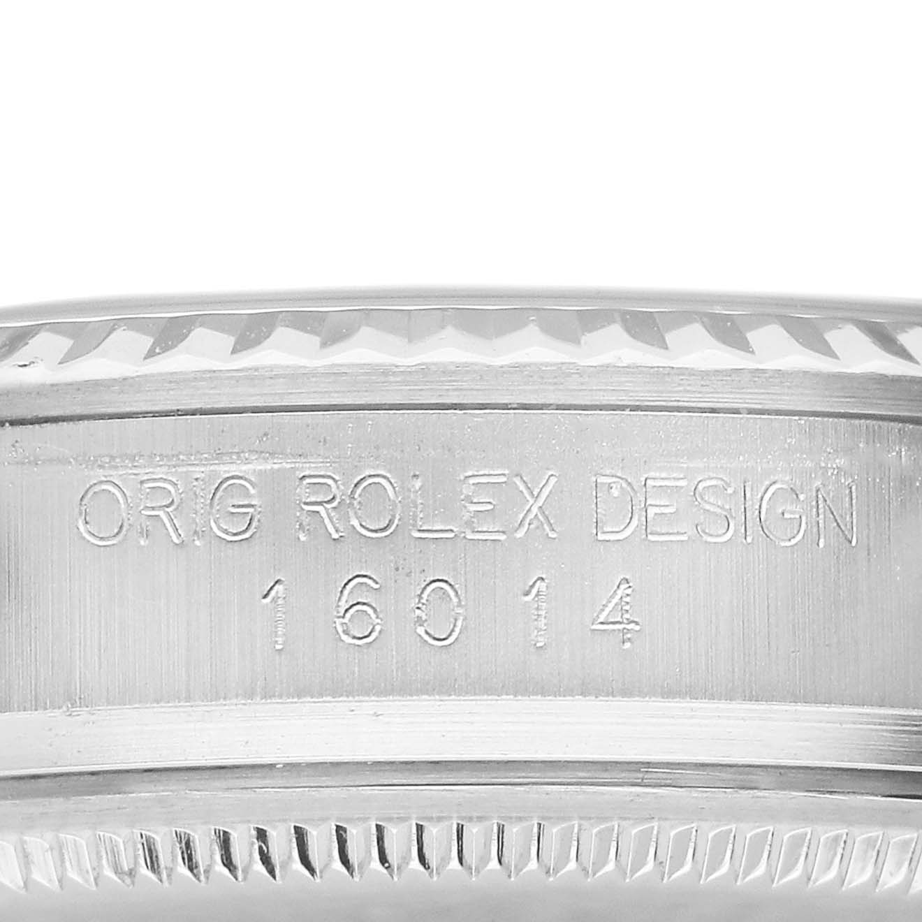 The image shows the side of a Rolex Datejust 16014 Men's Steel and Gold (two tone) Blue Dial watch case, focusing on the engraved model number.