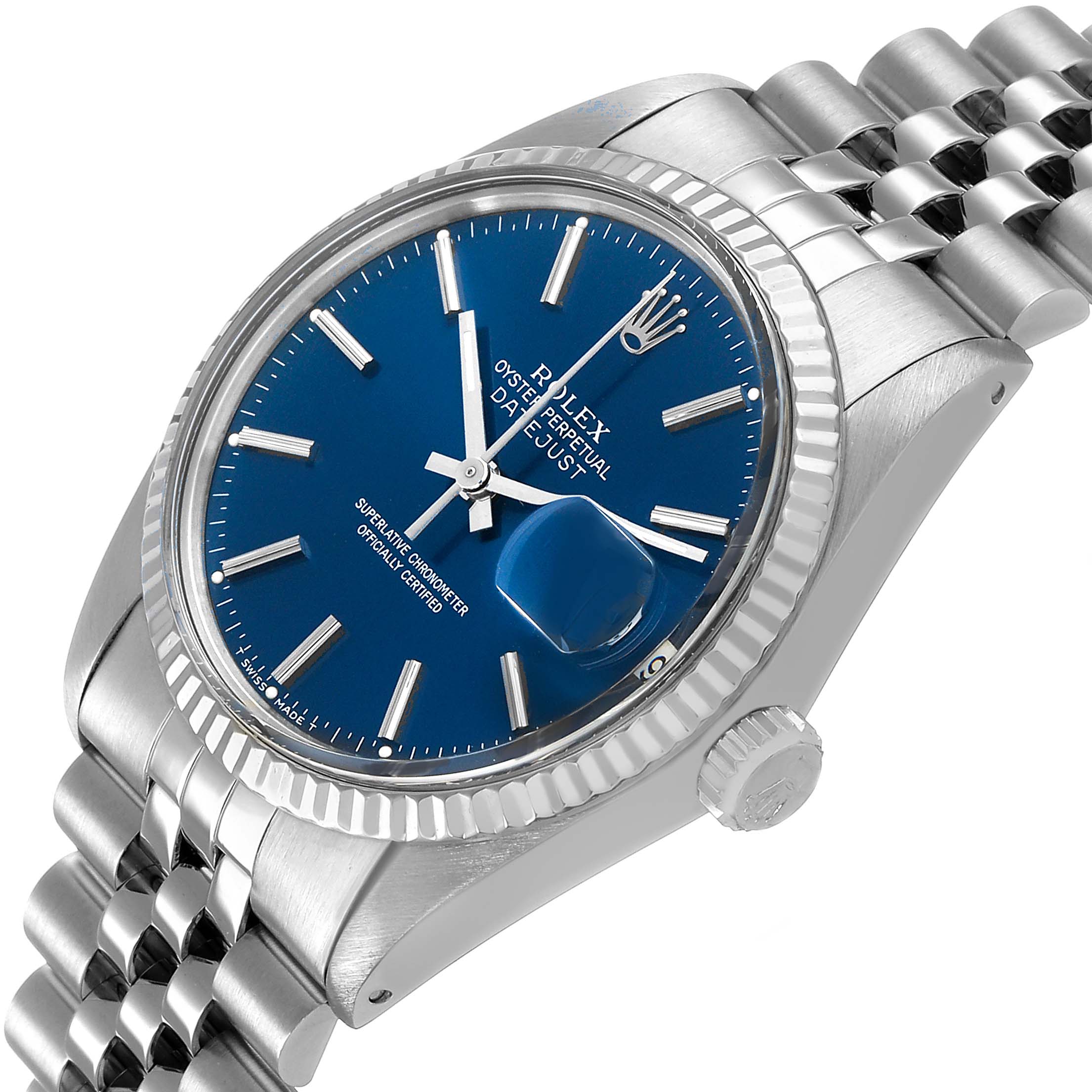 The Rolex Datejust 16014 Men's Steel and Gold (two tone) Blue Dial is shown in a three-quarter view, displaying its face, bezel, crown, and part of its bracelet.