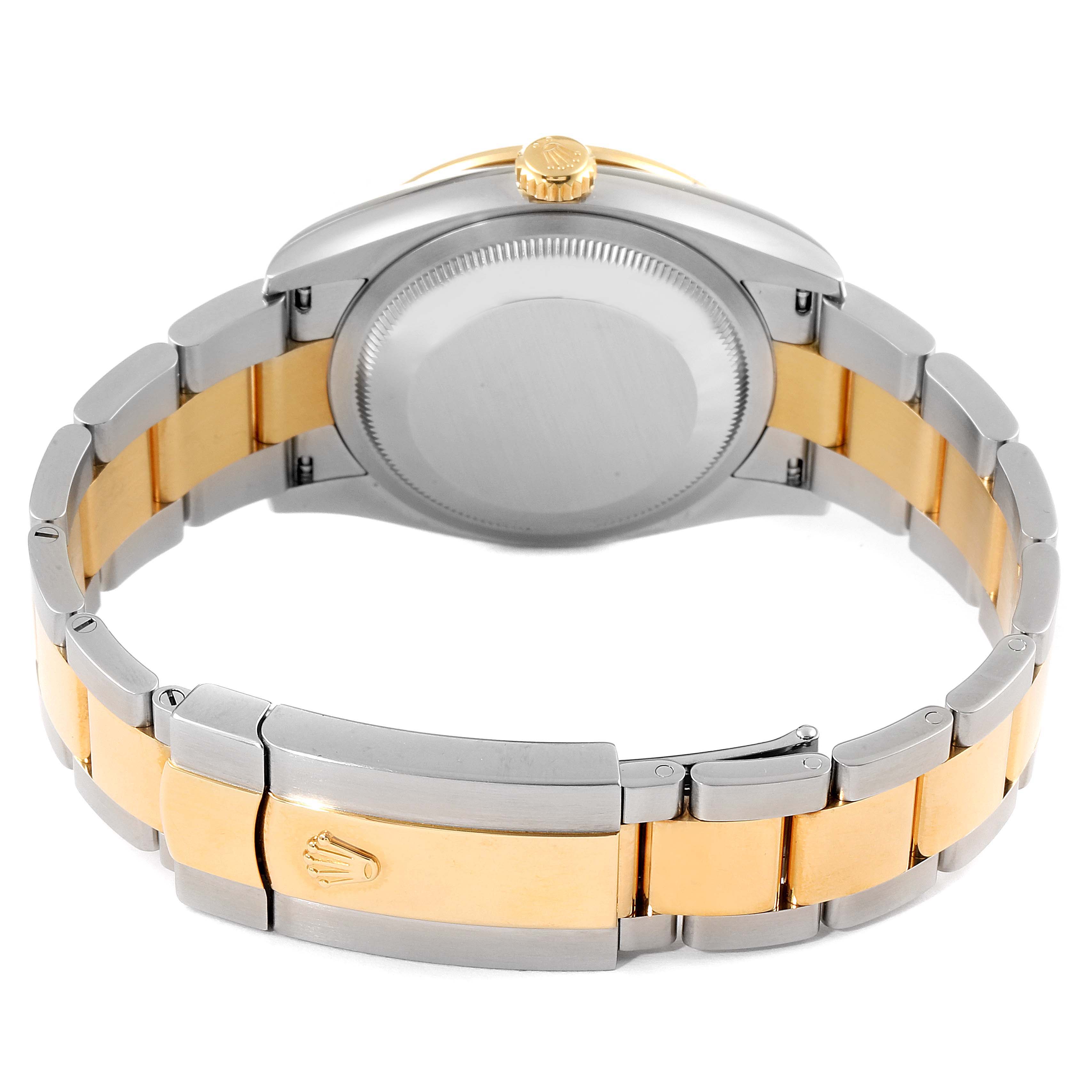 The image shows the back case and bracelet of a Rolex Datejust 126283 Men's Steel and Gold (two tone) White Dial 126283 Men's Steel and Gold (two tone) White Dial watch with a combination of steel and gold links.
