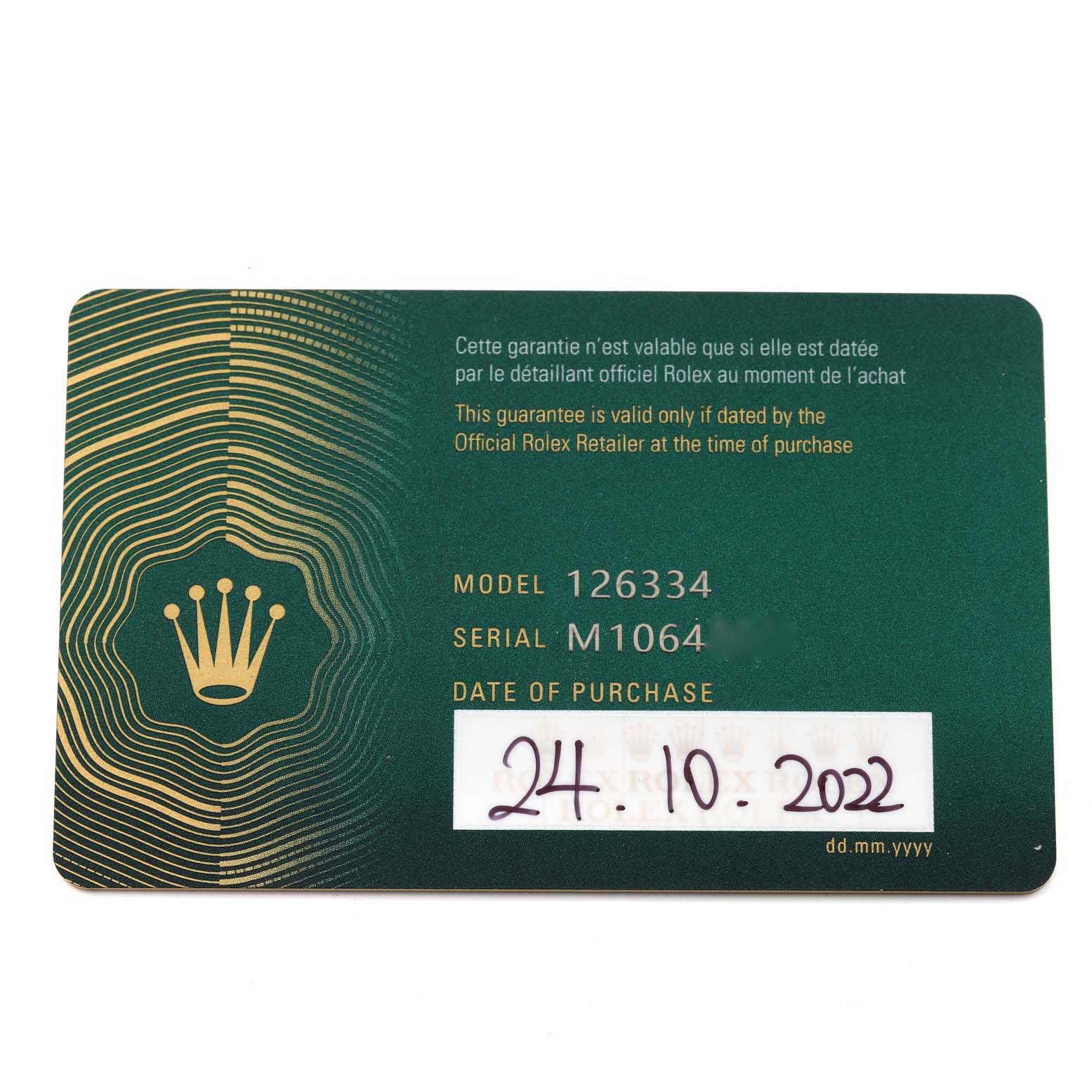 This is a green and gold warranty card for the Rolex Datejust 41 126334 Men
s Stainless Steel Green Dial 126334 Men
s Stainless Steel Green Dial model 126334, showing the date of purchase as 24.10.2022 and serial number M1064.