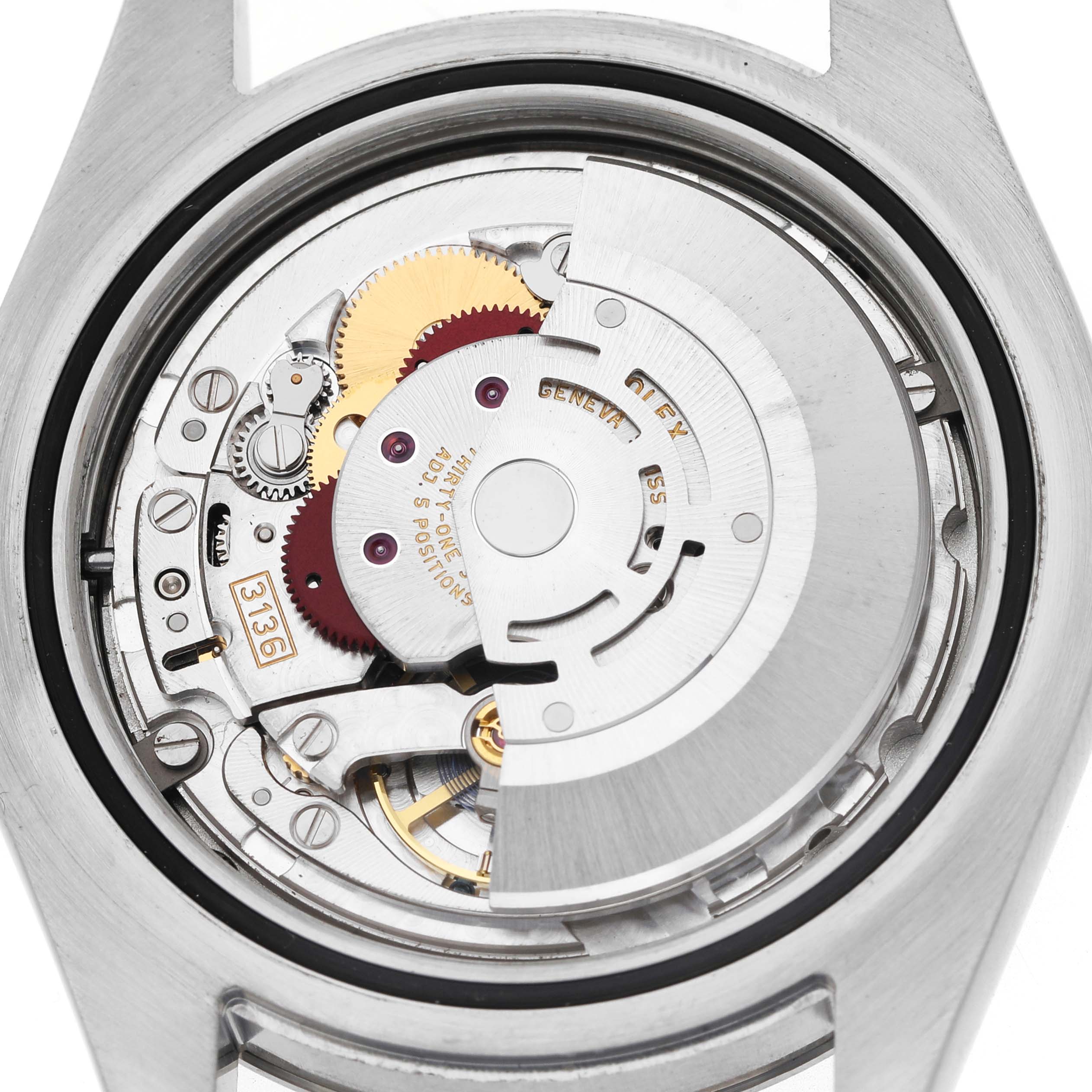 The image shows the internal movement of a Rolex Datejust 41 116334 Men's Stainless Steel Black Dial, highlighting gears and the rotor from the back view.