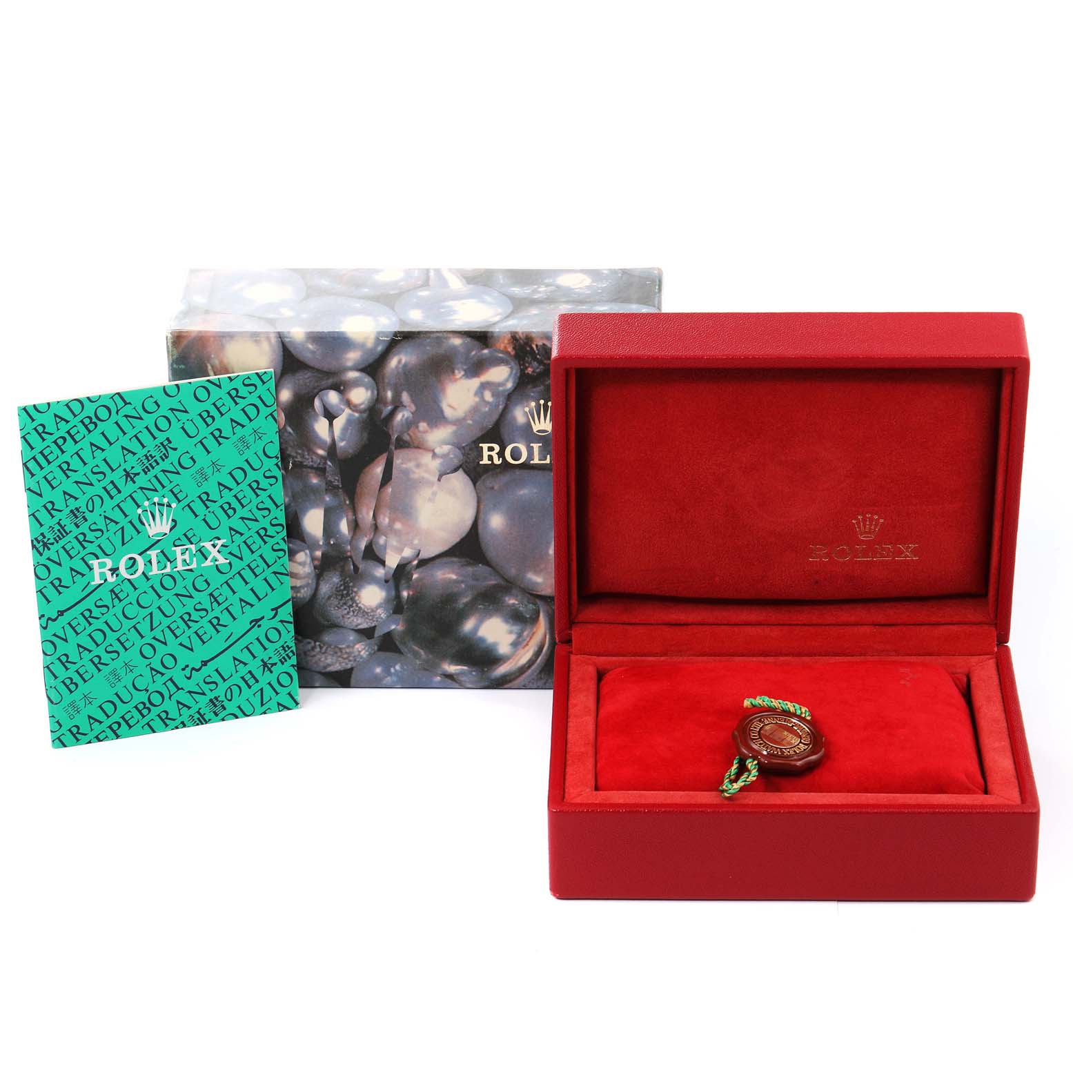 The image shows the box, booklet, and tag accessories of a Rolex Datejust 69174 Women's Stainless Steel Black Dial 69174 Women's Stainless Steel Black Dial watch, with the box opened to reveal the interior.