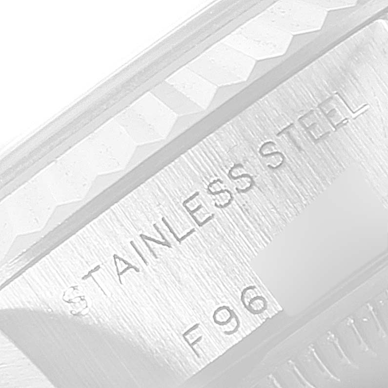 Close-up of the side view of a Rolex Datejust 79174 Women's Stainless Steel White Dial 79174 Women's Stainless Steel White Dial watch, showing the "Stainless Steel" engraving.