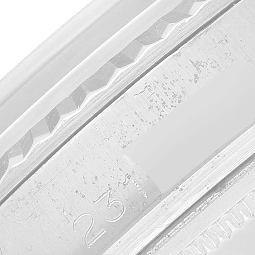 The image shows a close-up of the case and bezel detail of a Vintage Collection model by Rolex.