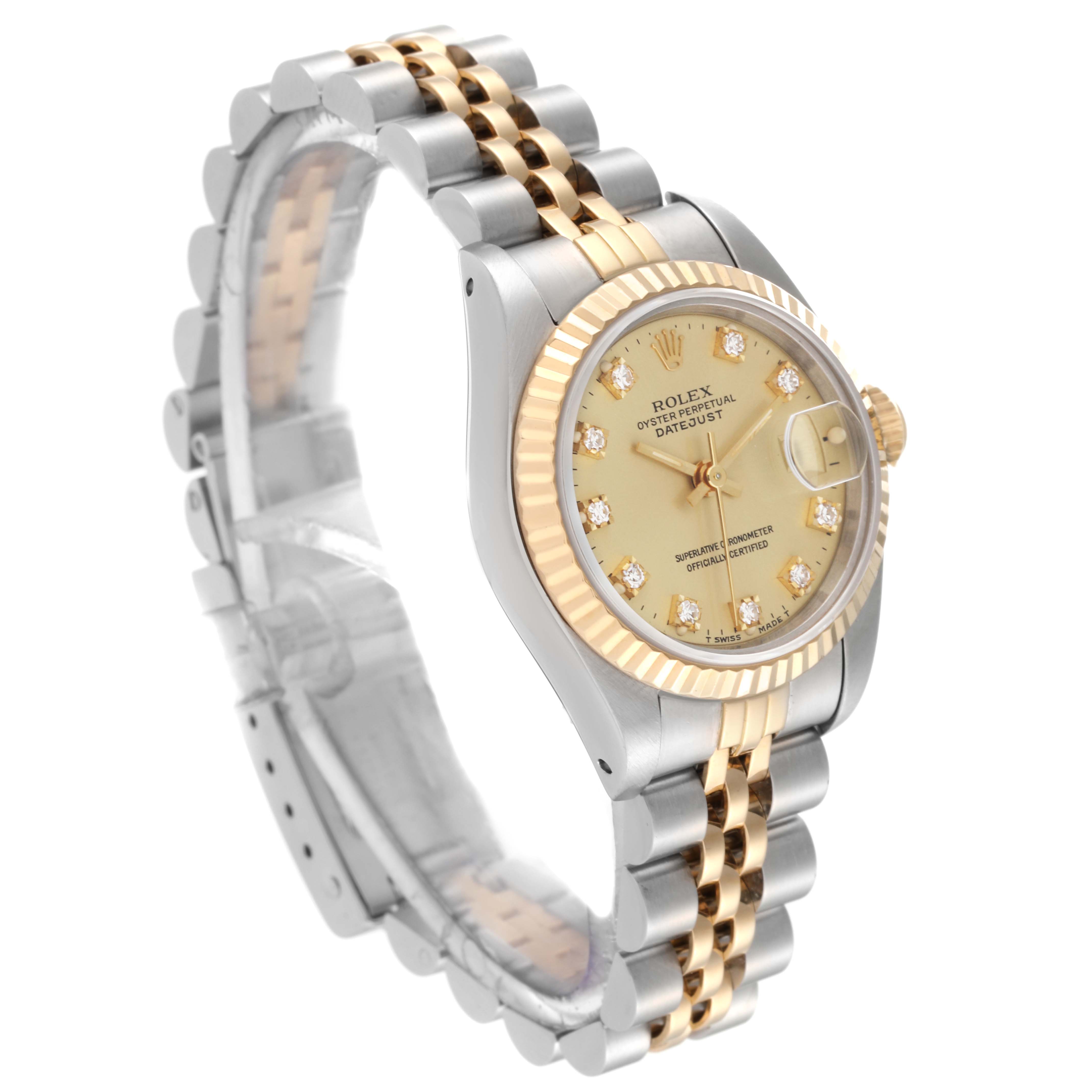 The image shows a Rolex Datejust 69173 Women's Steel and Gold (two tone) Champagne Dial 69173 Women's Steel and Gold (two tone) Champagne Dial watch at a slight side angle, highlighting its dial, fluted bezel, and Jubilee bracelet.