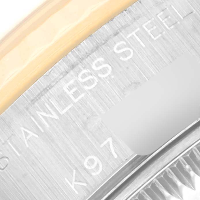 The image shows a close-up of the stainless steel rim and part of the bezel of a Rolex Datejust 79173 Women's Steel and Gold (two tone) Beige Dial 79173 Women's Steel and Gold (two tone) Beige Dial watch.