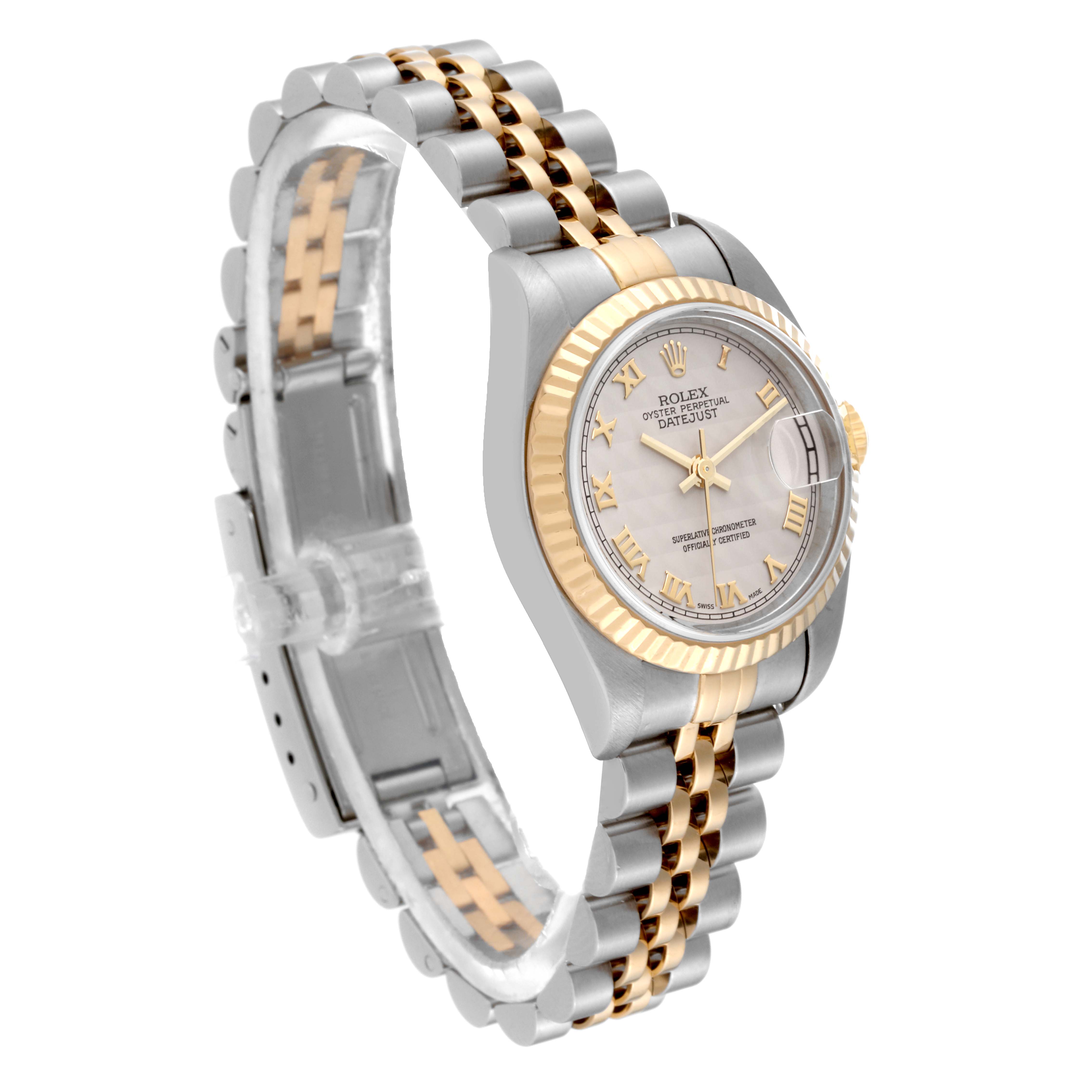 The Rolex Datejust 79173 Women's Steel and Gold (two tone) Beige Dial 79173 Women's Steel and Gold (two tone) Beige Dial watch is shown at a slightly tilted angle, highlighting its two-tone bracelet, fluted bezel, and dial.