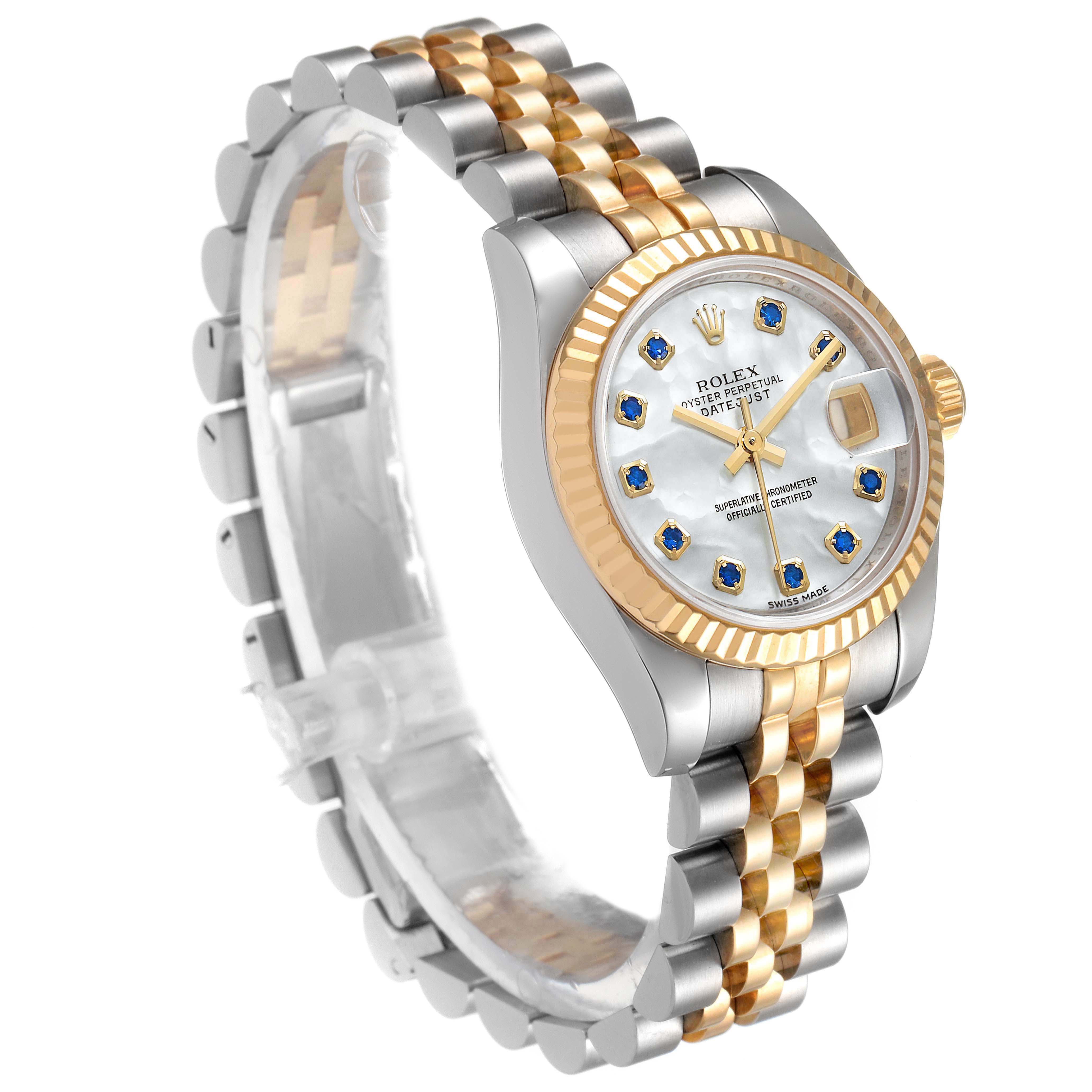 The image shows a Rolex Datejust 179173 Women's Steel and Gold (two tone) Mother of Pearl Dial 179173 Women's Steel and Gold (two tone) Mother of Pearl Dial watch at a three-quarter angle highlighting the face, bezel, and two-tone bracelet.