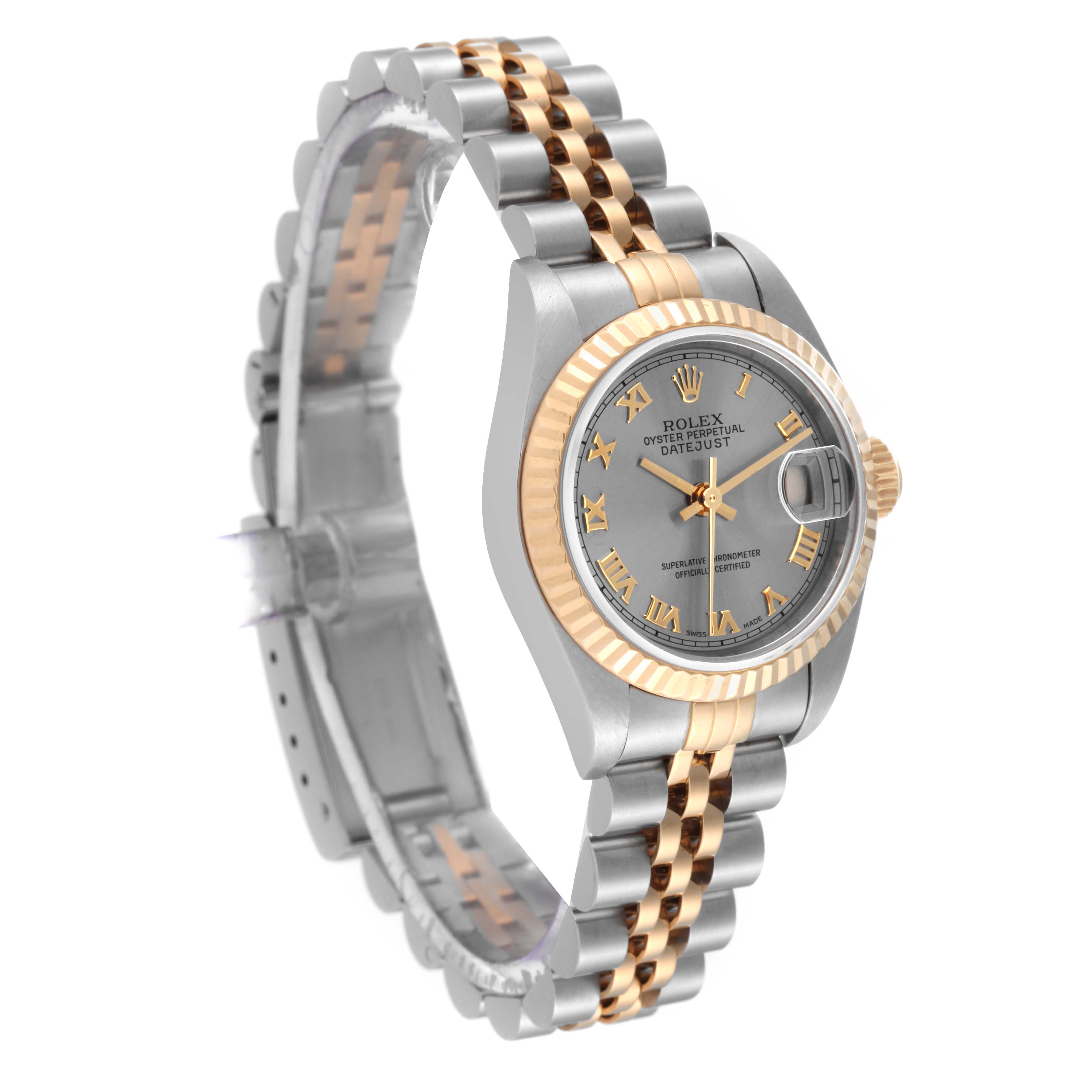 This Rolex Datejust 79173 Women's Steel and Gold (two tone) Grey Dial 79173 Women's Steel and Gold (two tone) Grey Dial watch is shown at a three-quarter angle, displaying the face, fluted bezel, and two-tone bracelet.