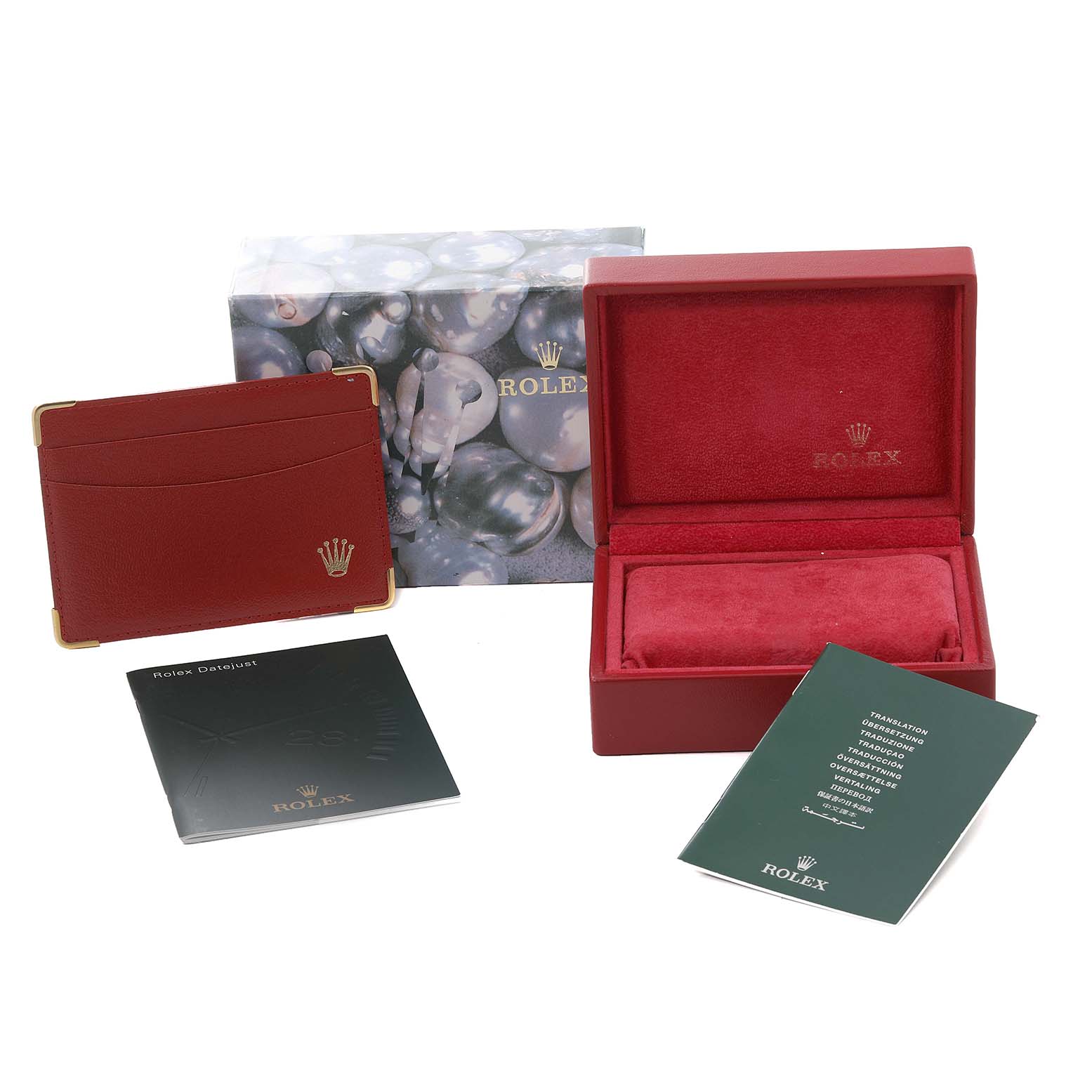 The image shows the packaging and accessories for a Rolex Datejust 79173 Women's Steel and Gold (two tone) Grey Dial 79173 Women's Steel and Gold (two tone) Grey Dial, including a box, cardholder, and instructional booklets.