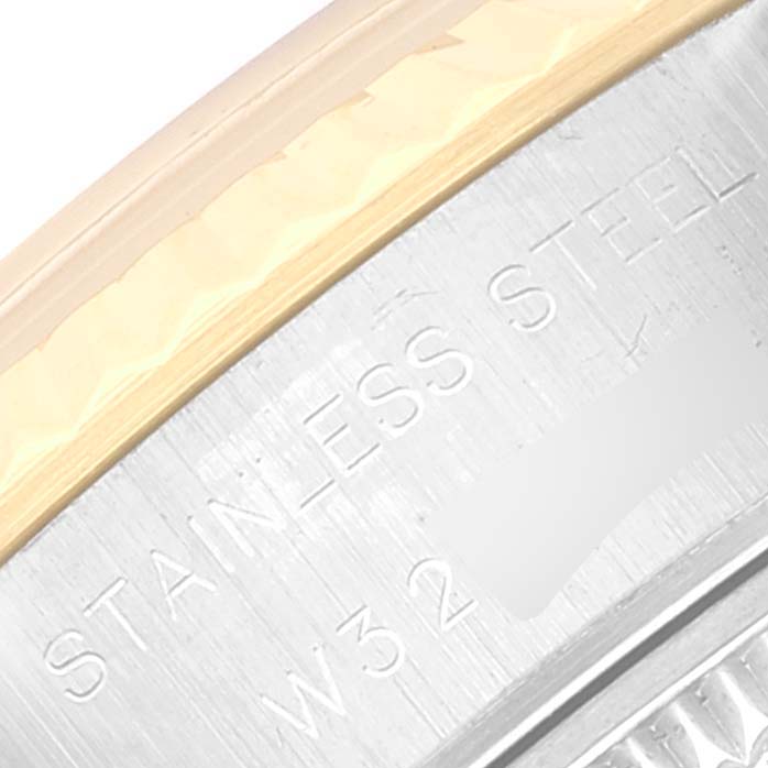 Partial close-up of the Rolex Datejust 69173 Women's Steel and Gold (two tone) Grey Dial 69173 Women's Steel and Gold (two tone) Grey Dial model's case back, showing "STAINLESS STEEL" engraving.