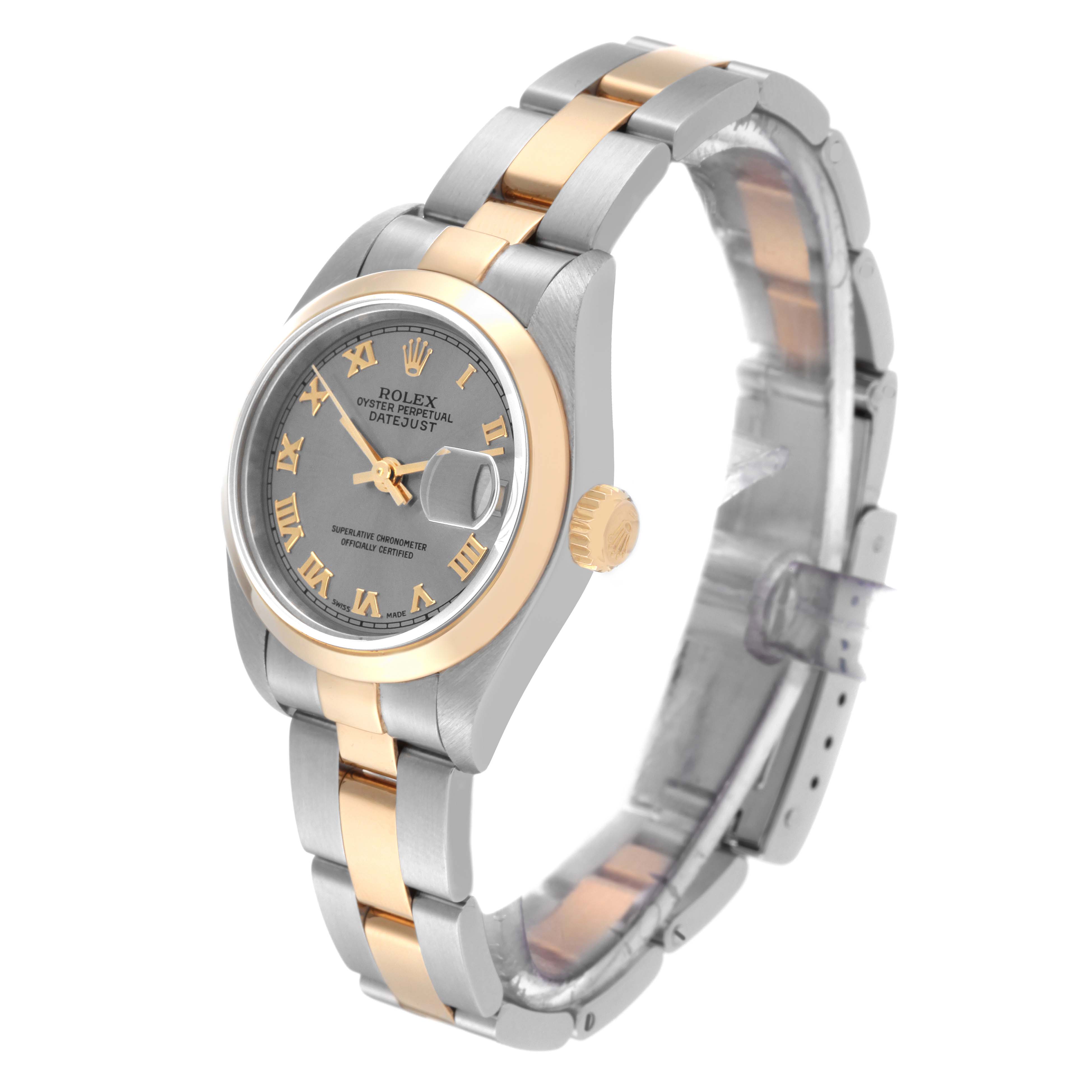 The image shows a side angle of the Rolex Datejust 79163 Women's Steel and Gold (two tone) Grey Dial 79163 Women's Steel and Gold (two tone) Grey Dial watch, highlighting its gold and silver bracelet, dial, and crown.