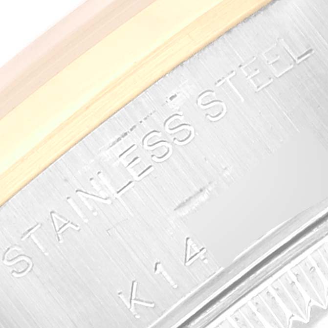 This image shows a close-up of the stainless steel and gold components on the back of a Rolex Datejust 79163 Women's Steel and Gold (two tone) Grey Dial 79163 Women's Steel and Gold (two tone) Grey Dial watch.