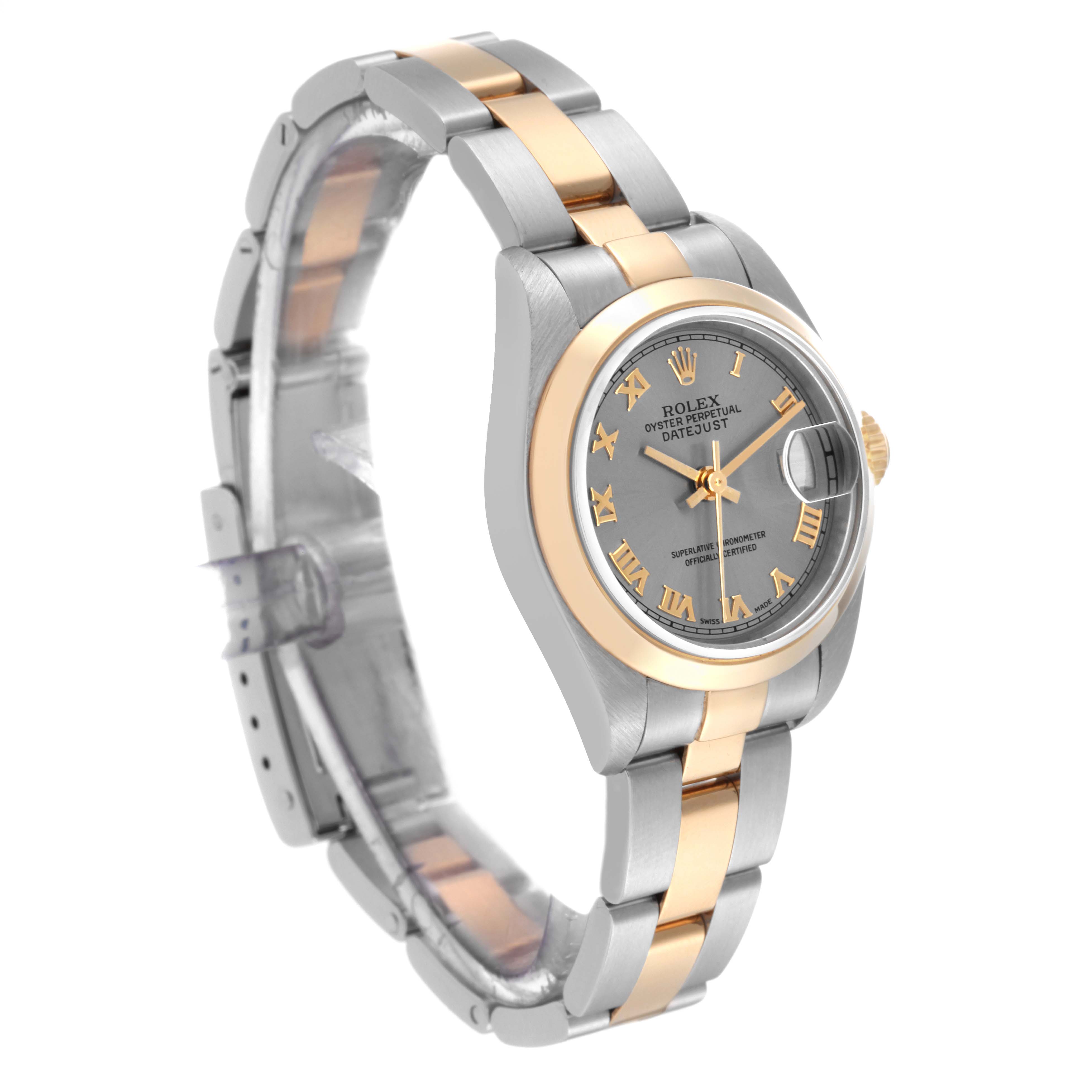 This image shows a Rolex Datejust 79163 Women's Steel and Gold (two tone) Grey Dial 79163 Women's Steel and Gold (two tone) Grey Dial watch at a three-quarter angle, highlighting the dial, bezel, and two-tone bracelet.