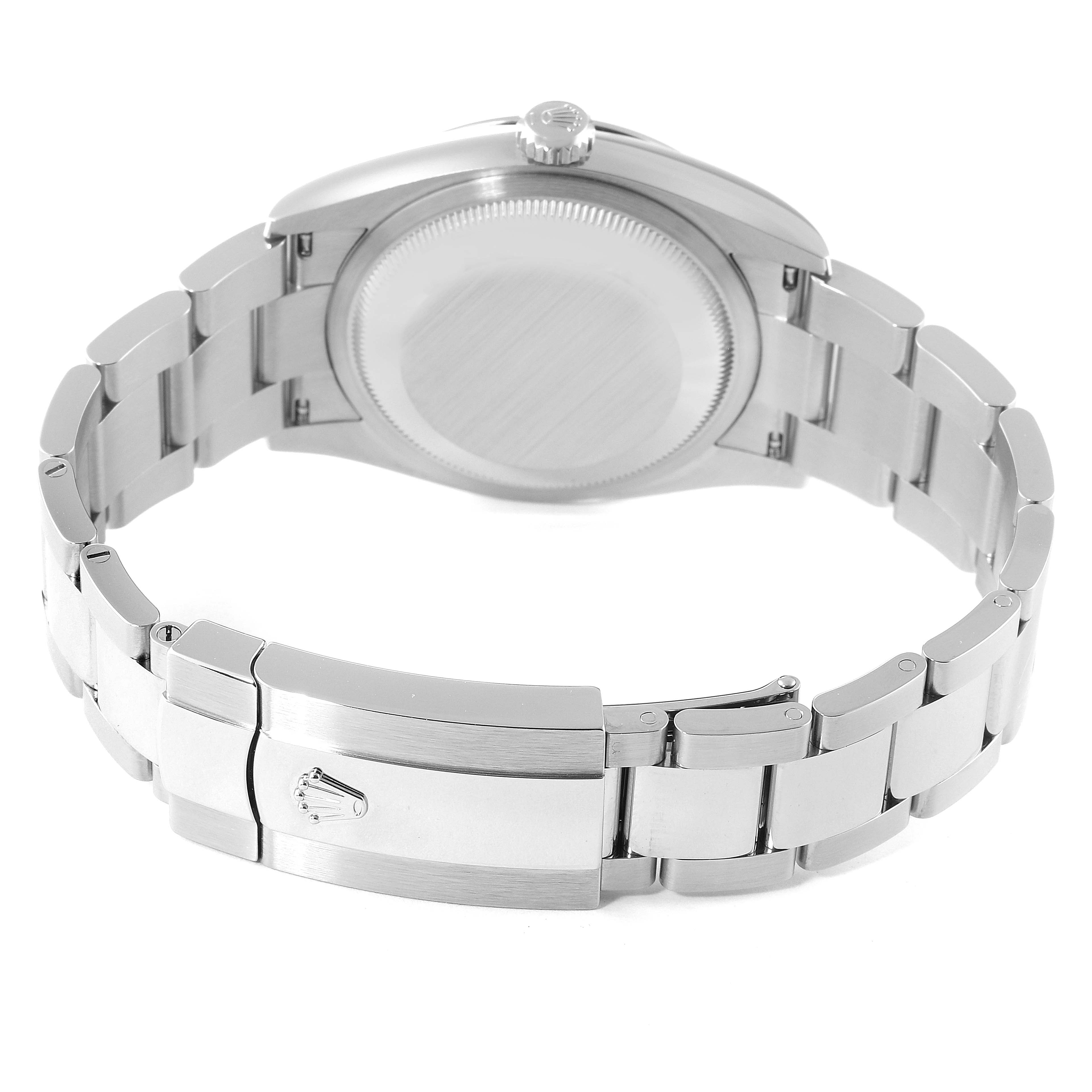 The image shows a rear view of the Rolex Datejust 126200 Men
s Stainless Steel White Dial 126200 Men
s Stainless Steel White Dial watch, highlighting its case back and metal bracelet with clasp.