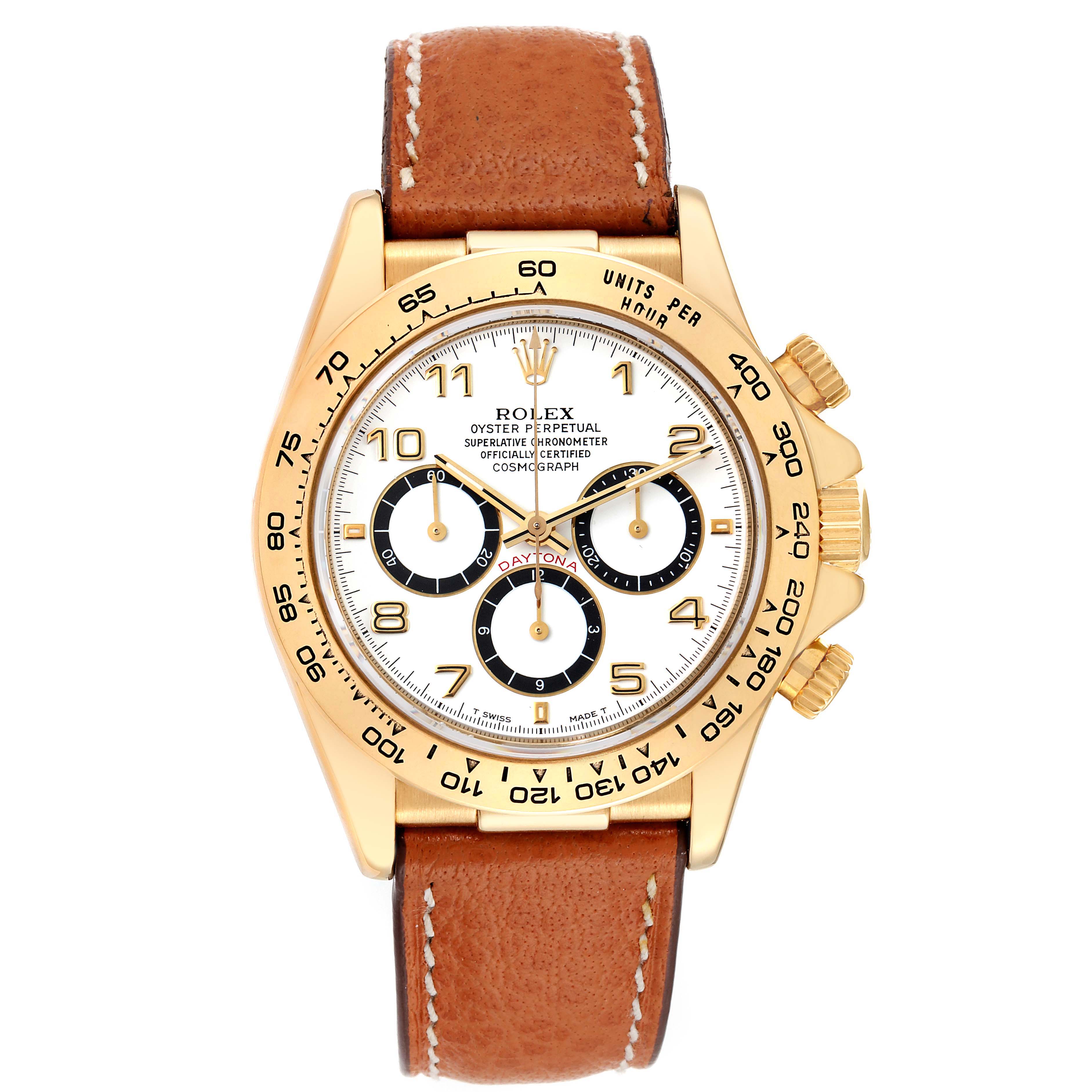 The image shows a front angle of a Rolex Daytona 16518 Men's Yellow Gold White Dial 16518 Men's Yellow Gold White Dial watch with a brown leather strap and a gold case.