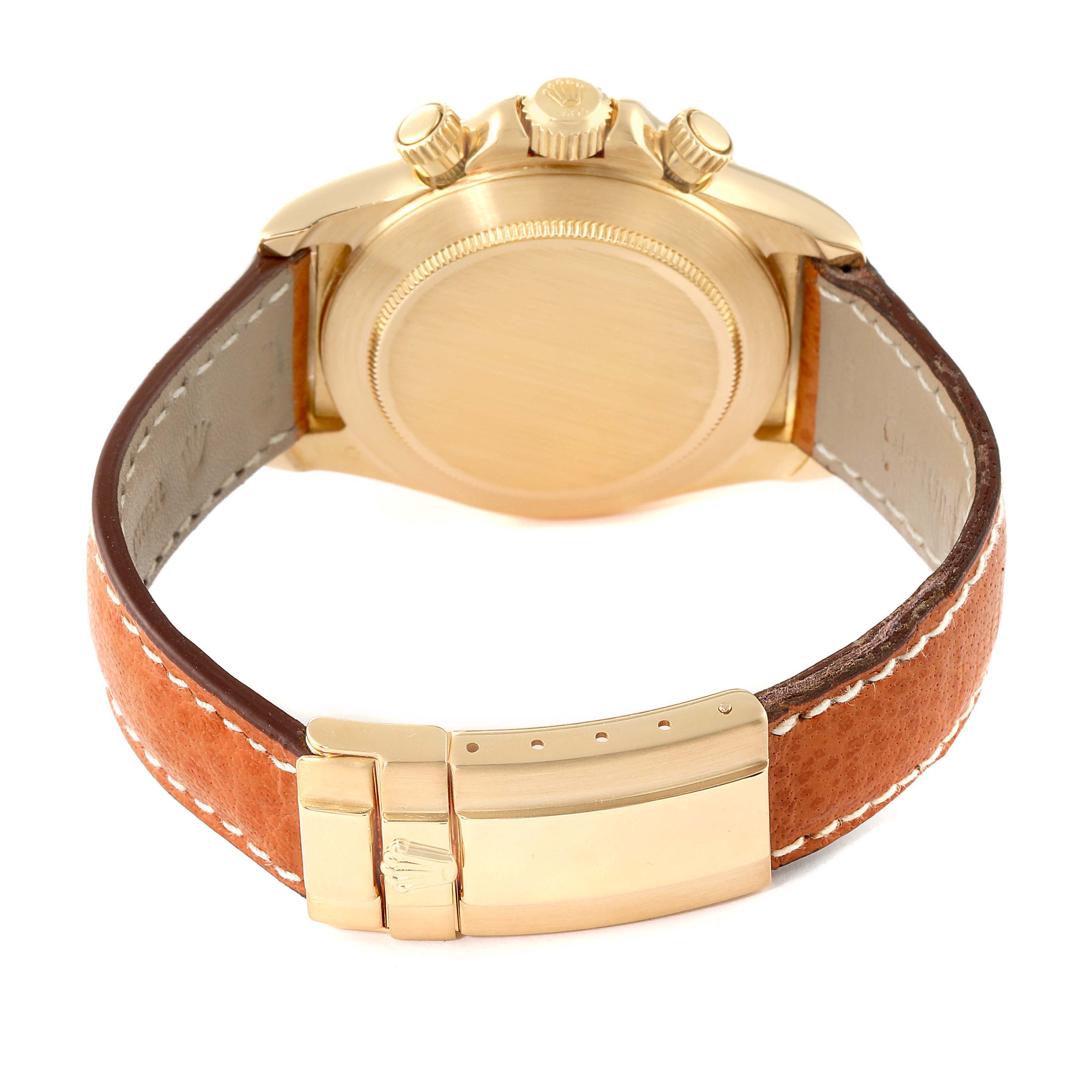 The image shows the back case and clasp of a Rolex Daytona 16518 Men's Yellow Gold White Dial 16518 Men's Yellow Gold White Dial watch with a brown leather strap, photographed from the rear.