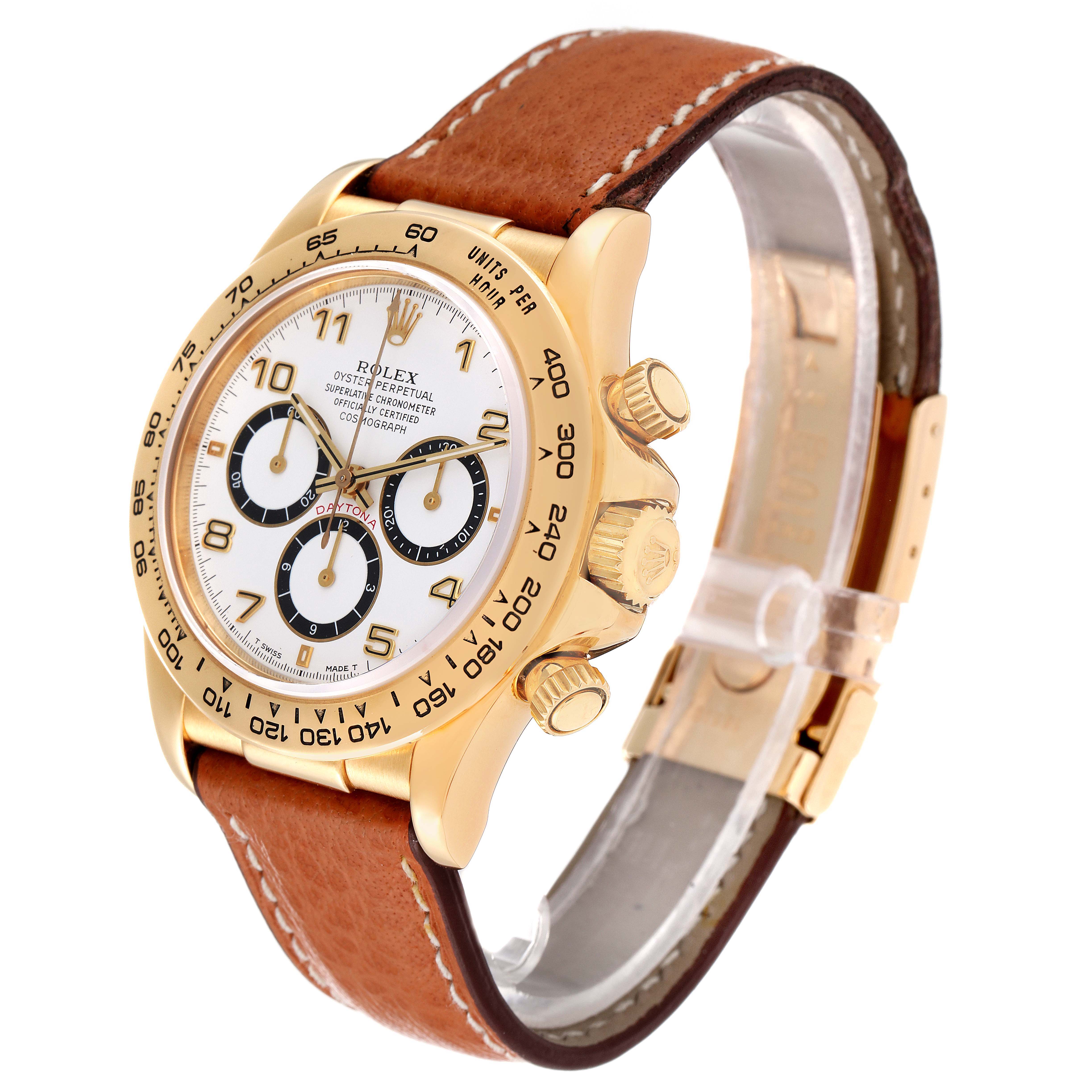 This image shows a Rolex Daytona 16518 Men's Yellow Gold White Dial 16518 Men's Yellow Gold White Dial watch at an angled side view, highlighting the dial, bezel, crown, and leather strap.