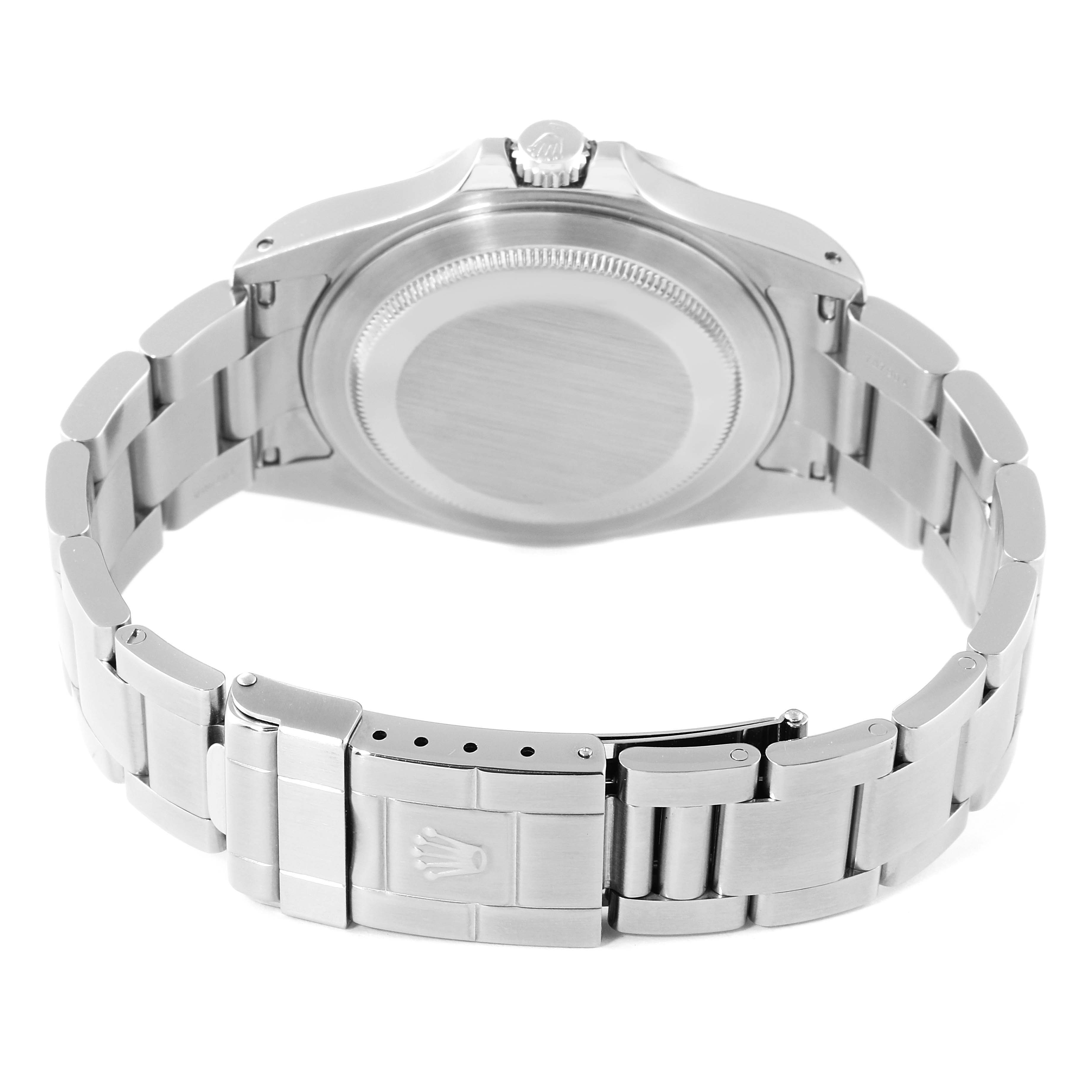 The image shows the back and bracelet of a Rolex Explorer 16570 Men's Stainless Steel Black Dial 16570 Men's Stainless Steel Black Dial model watch from a slightly tilted top angle.