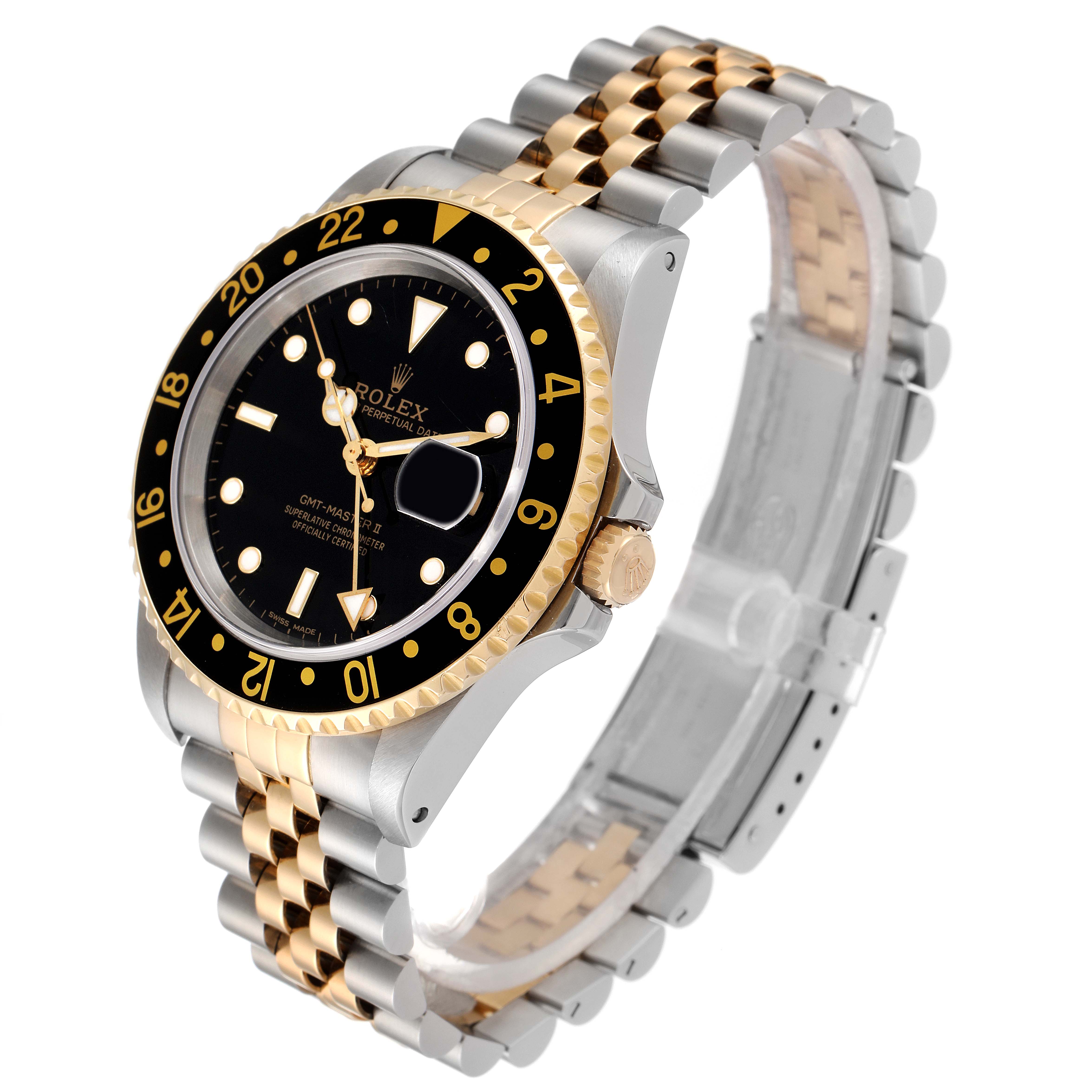 The image shows a Rolex GMT-Master 16713 Men's Steel and Gold (two tone) Black Dial 16713 Men's Steel and Gold (two tone) Black Dial watch from an angled side view, highlighting its bezel, crown, and two-tone bracelet.