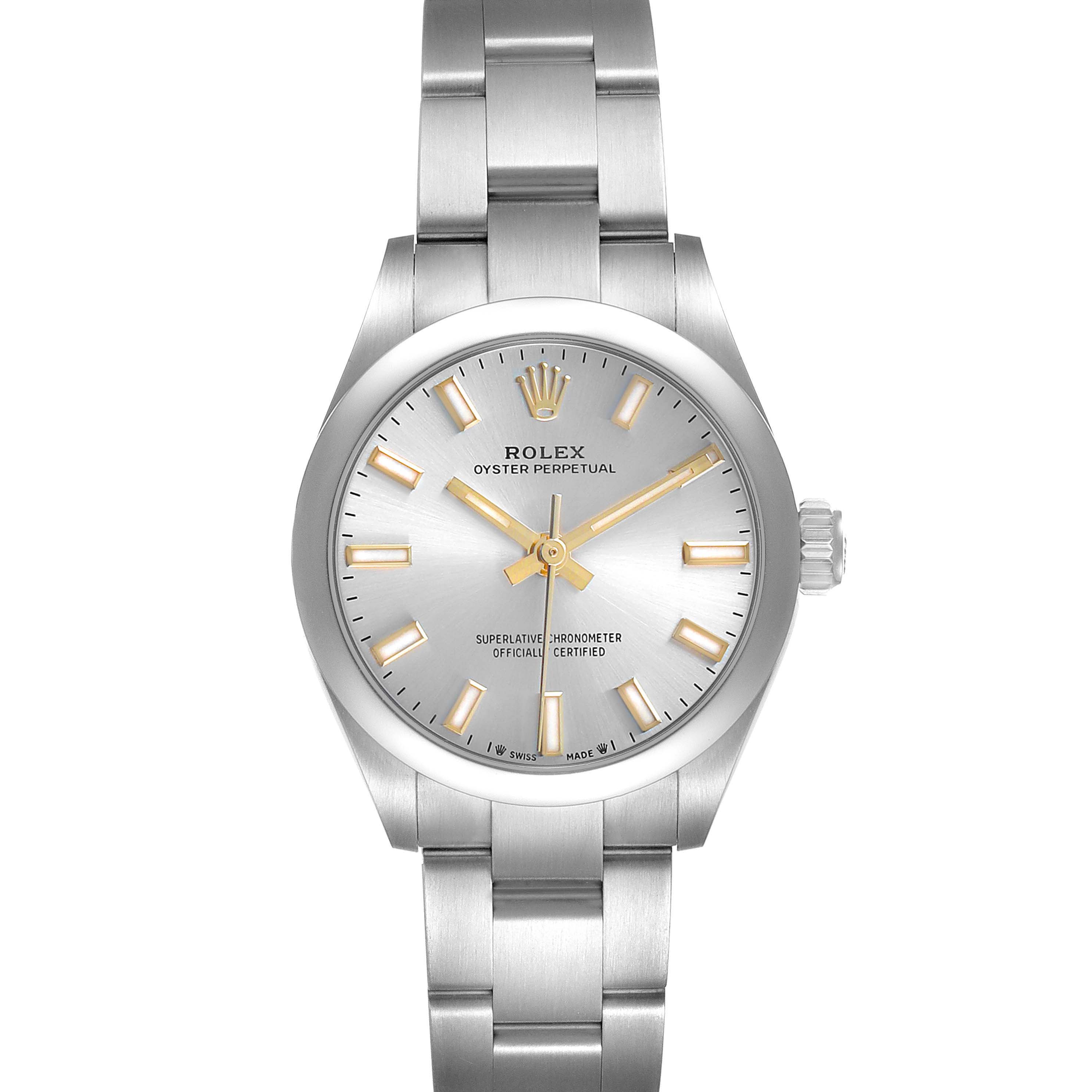 The Rolex Oyster Perpetual 276200 Women's Stainless Steel Silver Dial watch is shown from a top-down angle, highlighting the face, hands, indices, crown, and bracelet.