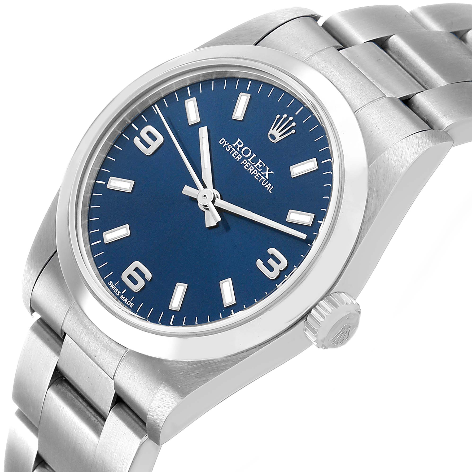 The Rolex Oyster Perpetual 77080 Women's Stainless Steel Blue Dial watch is shown at an angle, highlighting the blue dial, markers, crown, and part of the bracelet.