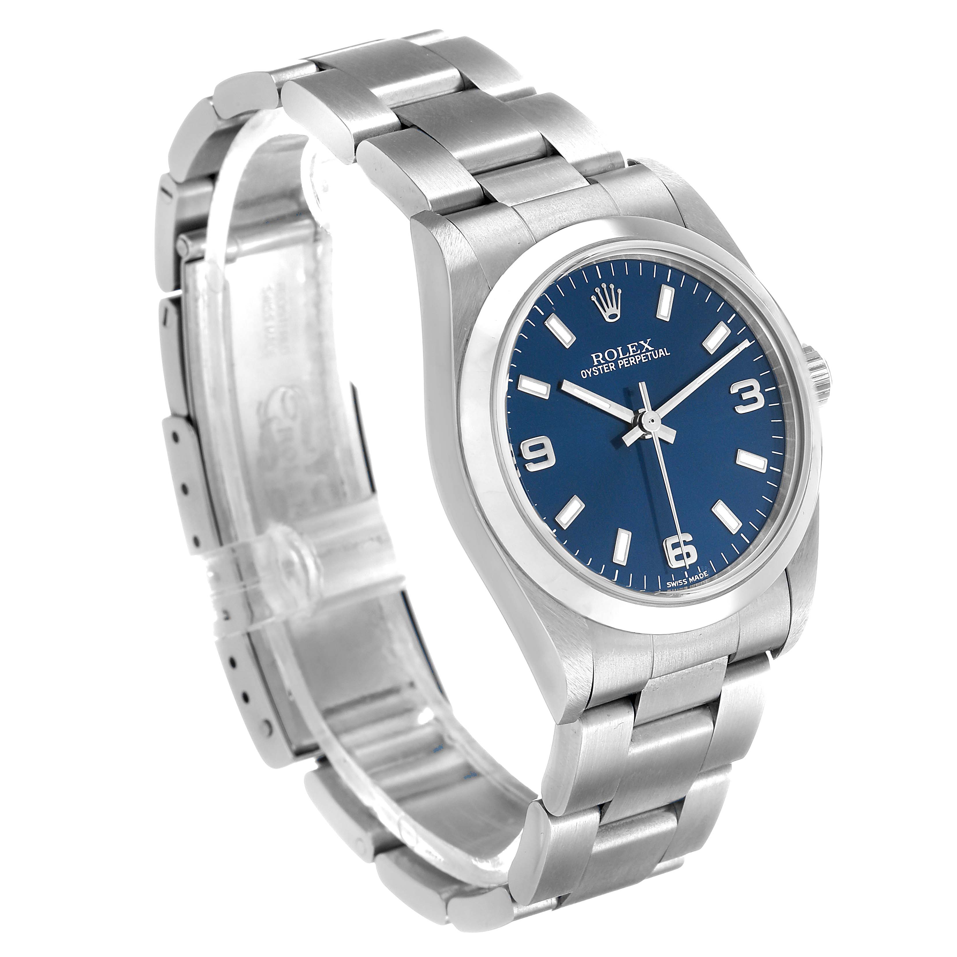 The Rolex Oyster Perpetual 77080 Women's Stainless Steel Blue Dial watch is shown at a three-quarter angle, highlighting the blue dial, case, and bracelet.