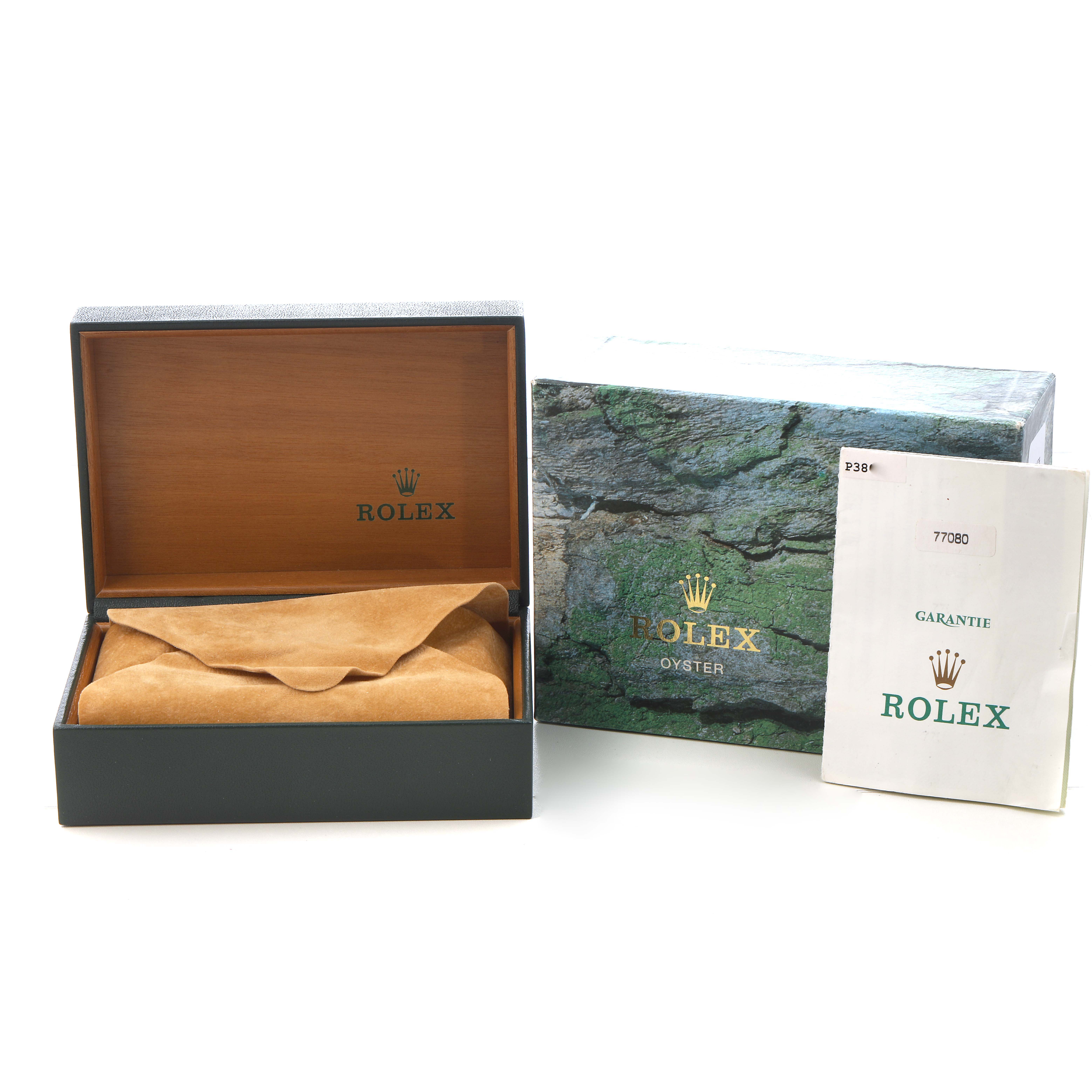 The image shows a Rolex Oyster Perpetual 77080 Women's Stainless Steel Blue Dial watch box set, including an open box, protective pouch, outer box, and guarantee booklet.