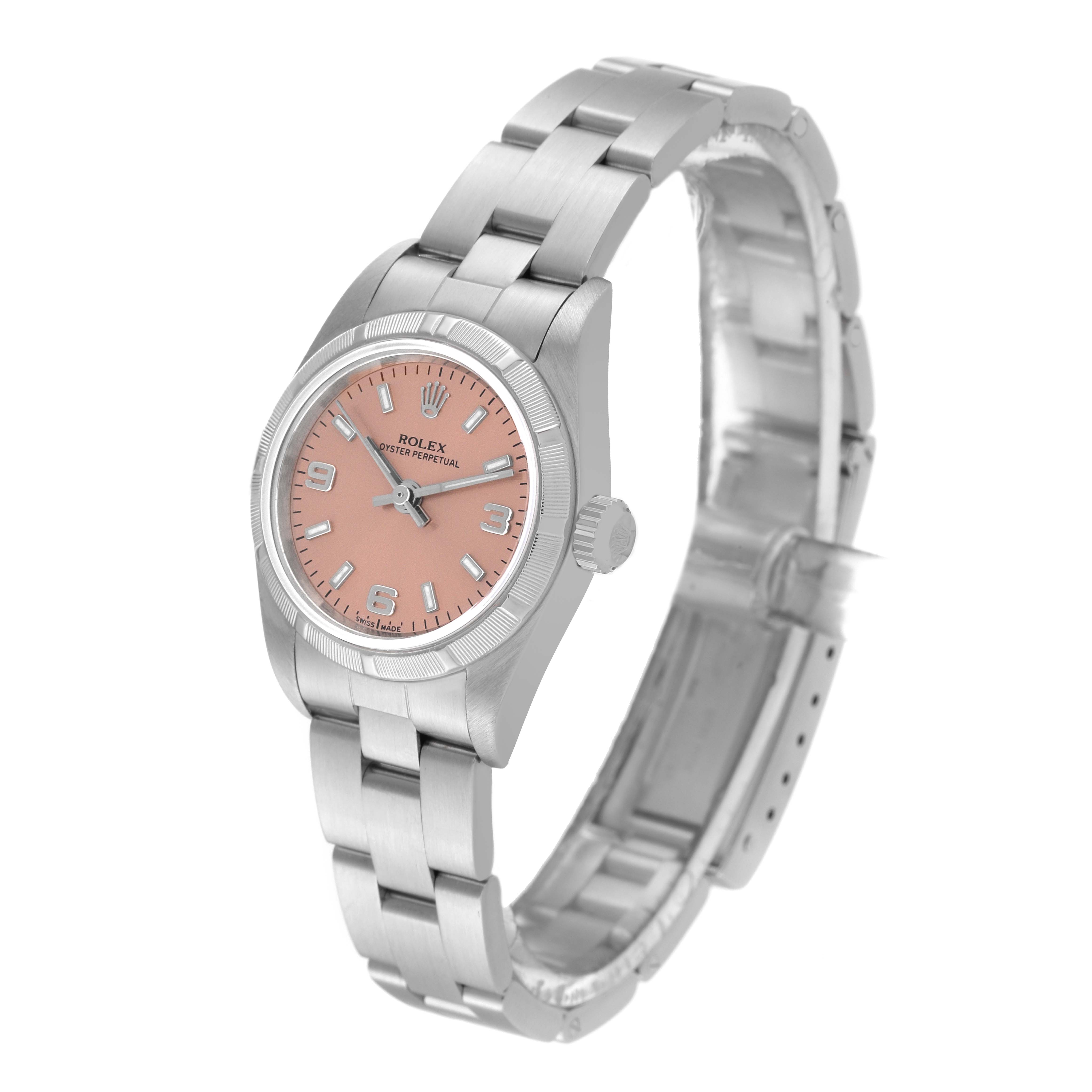 The Rolex Datejust 76030 Women's Stainless Steel Pink Dial 76030 Women's Stainless Steel Pink Dial watch is pictured at a slight angle, showing its pink dial, silver case, crown, and metal bracelet.