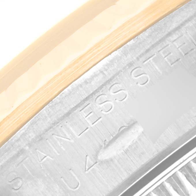 The image shows a close-up of the stainless steel case back of a Rolex Oyster Perpetual 67193 Women's Steel and Gold (two tone) Black Dial 67193 Women's Steel and Gold (two tone) Black Dial watch.