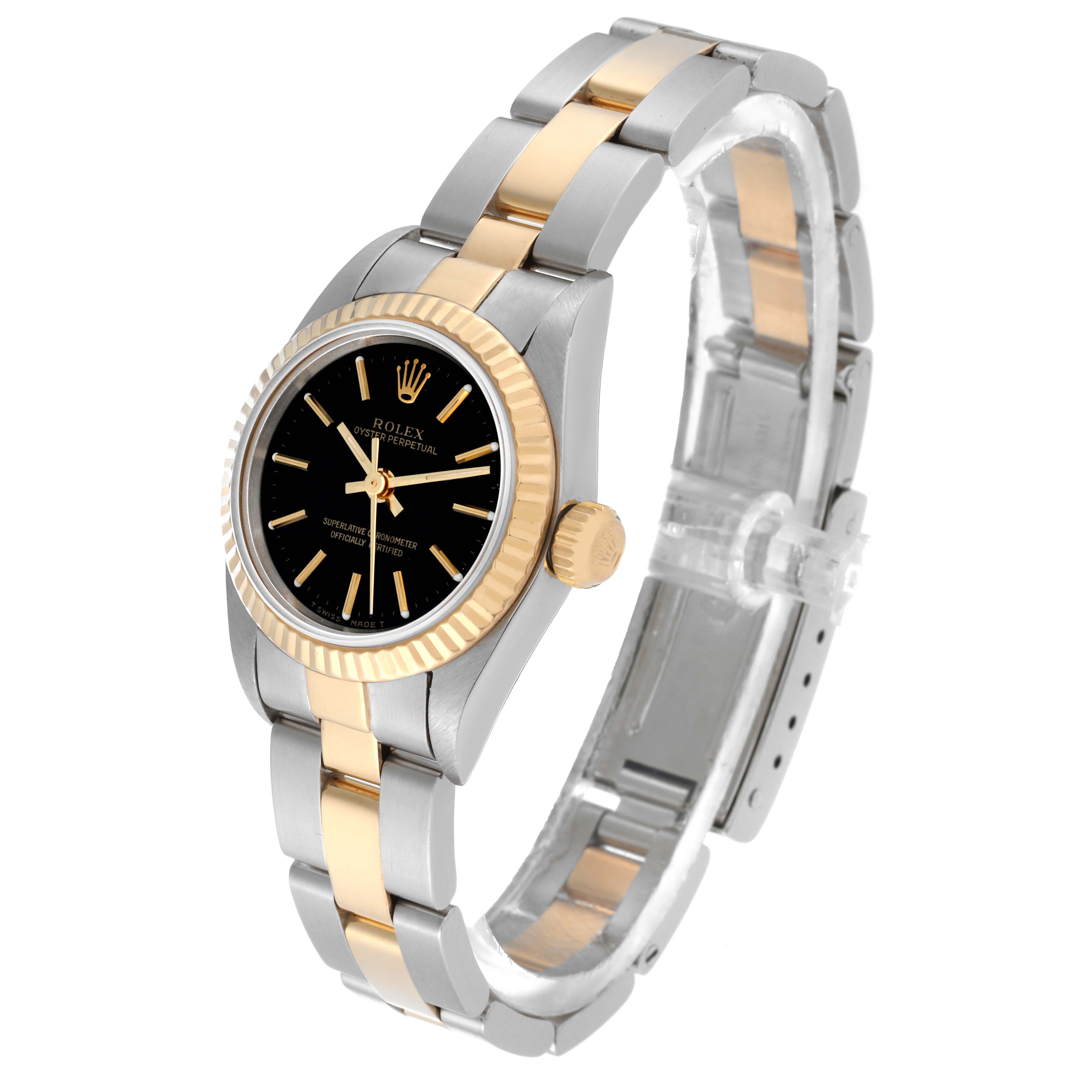 The image shows a Rolex Oyster Perpetual 67193 Women's Steel and Gold (two tone) Black Dial 67193 Women's Steel and Gold (two tone) Black Dial watch from an angled side view, focusing on the watch face, bezel, and bracelet.